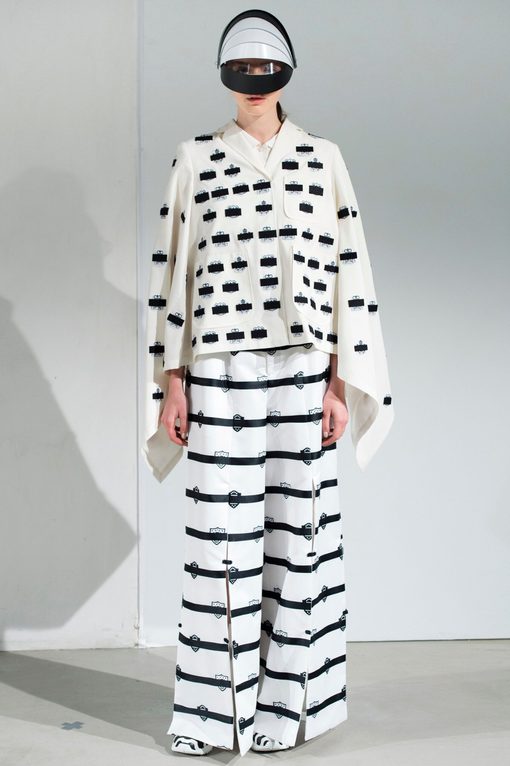 white black embroidered cape and pants