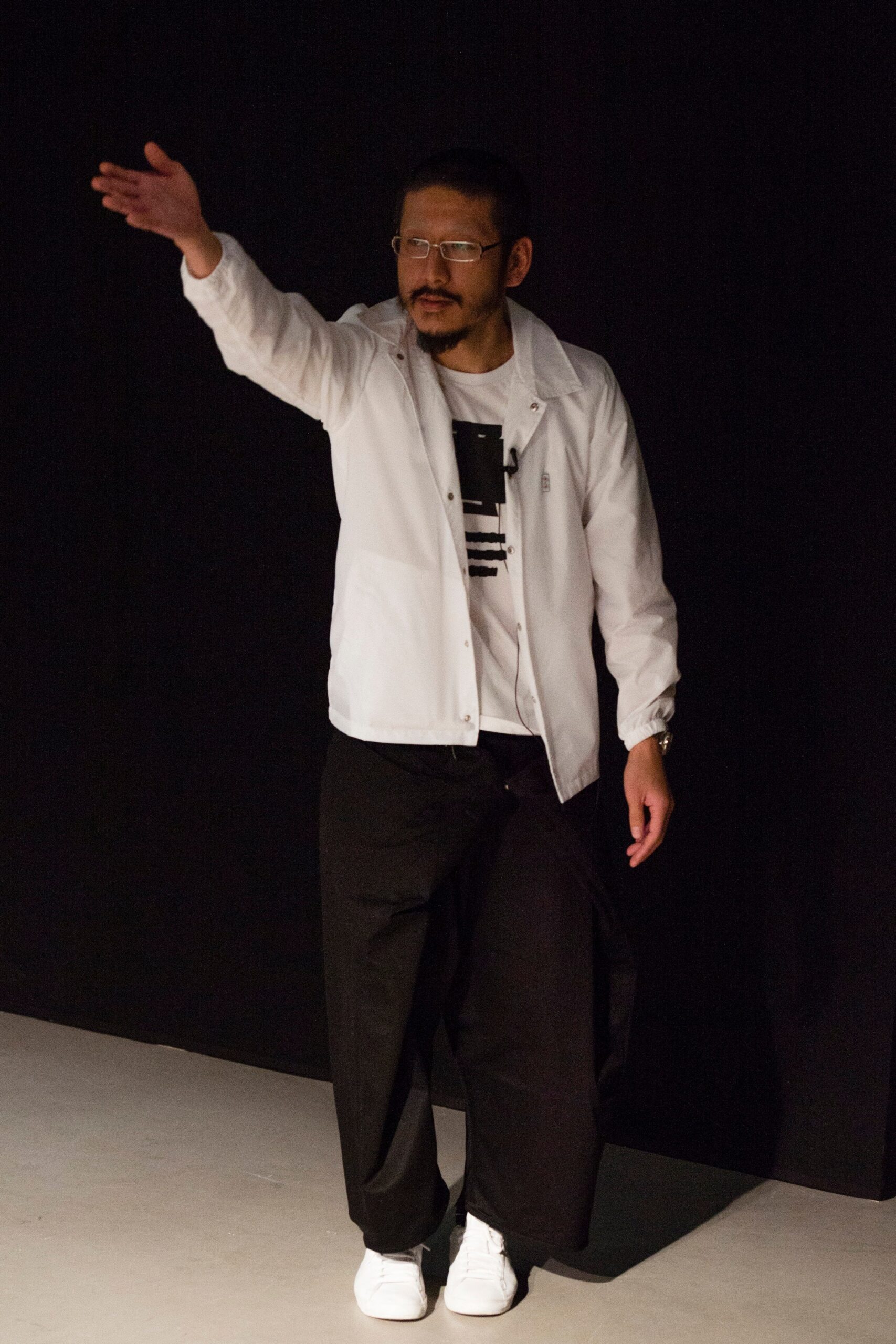 white jacket black pants outfit
