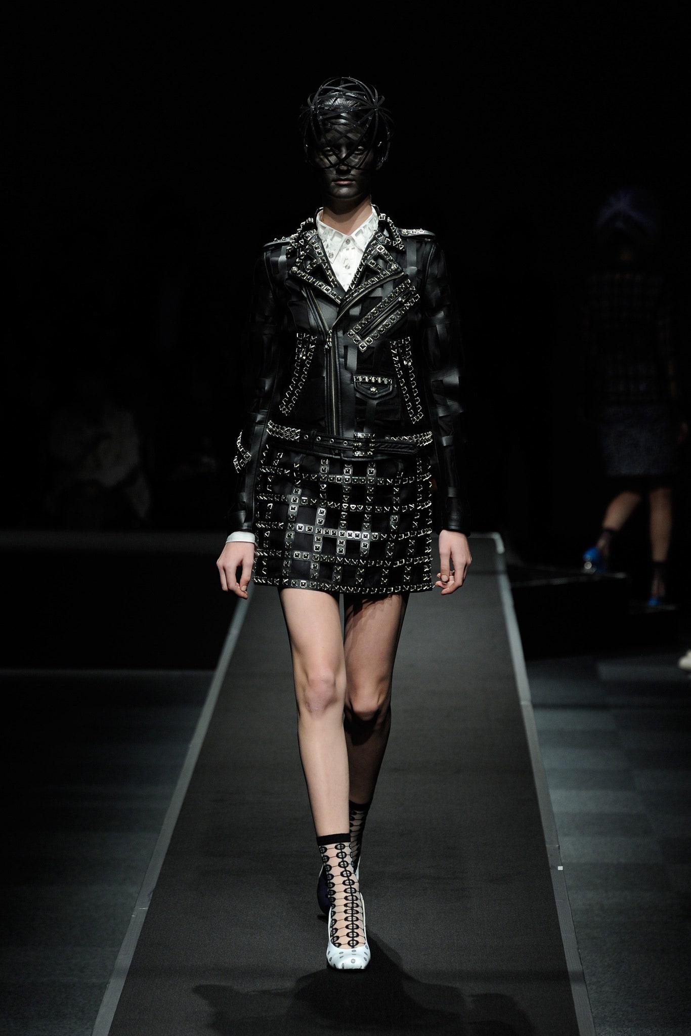 black leather fitted jacket and skirt