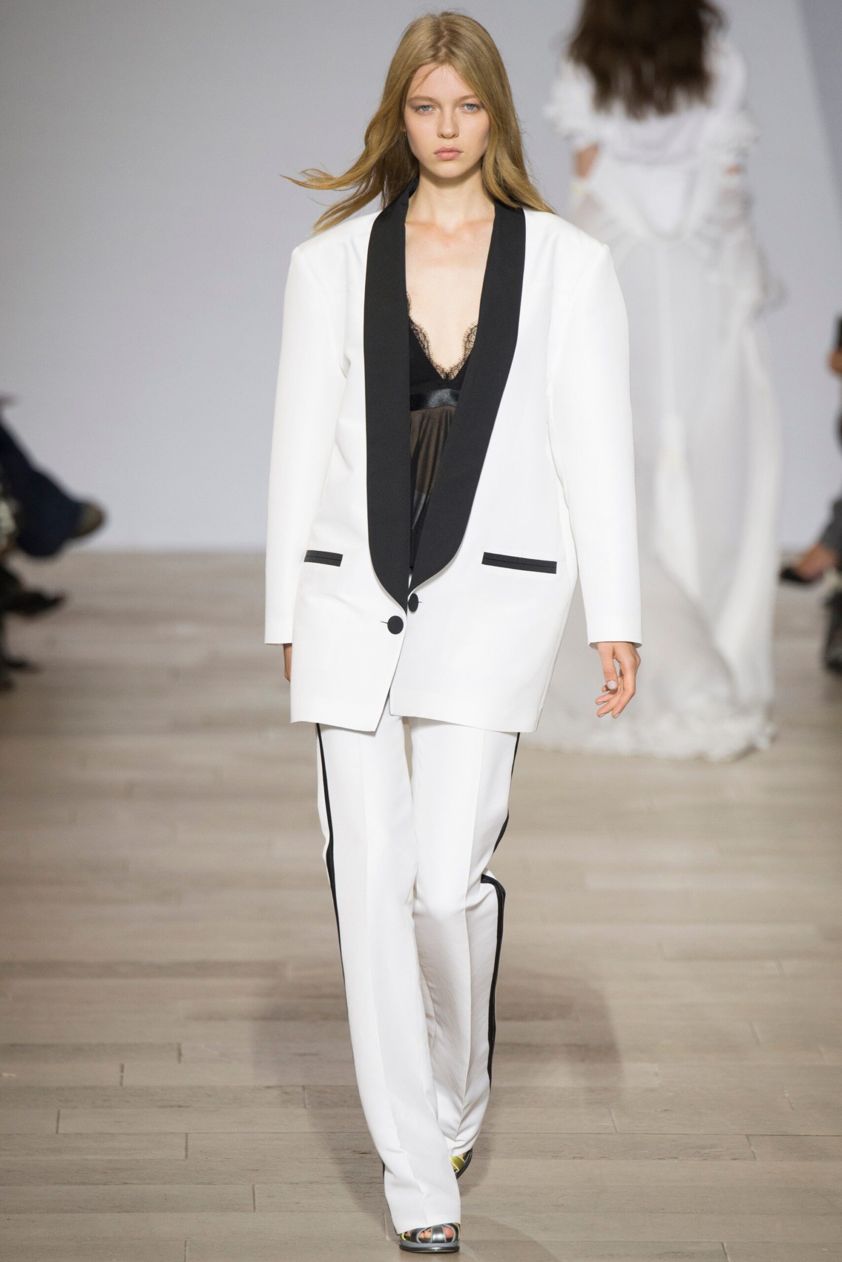 tailored white suit with black top