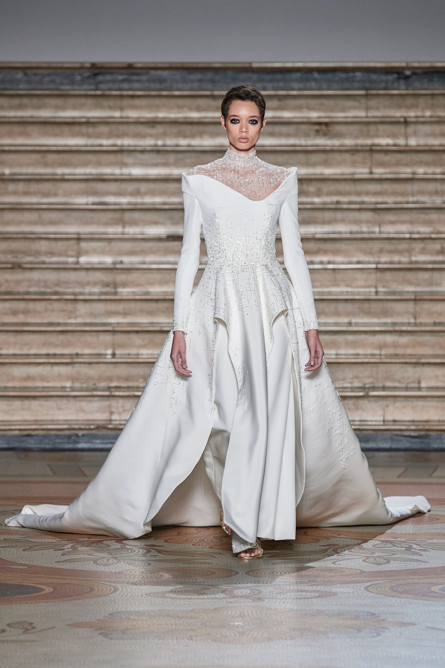 white silk embroidered gown