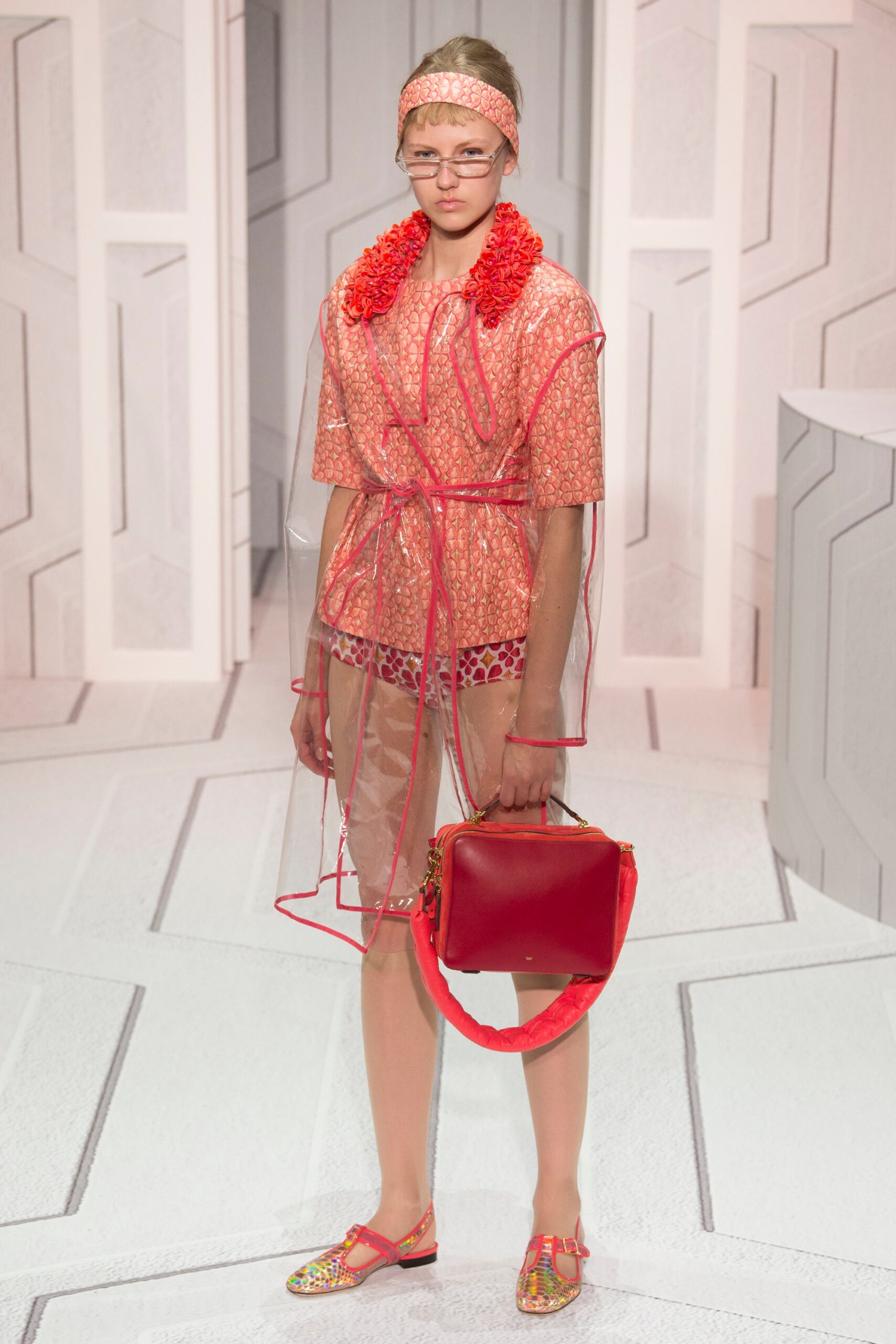 red sheer coat with pink top