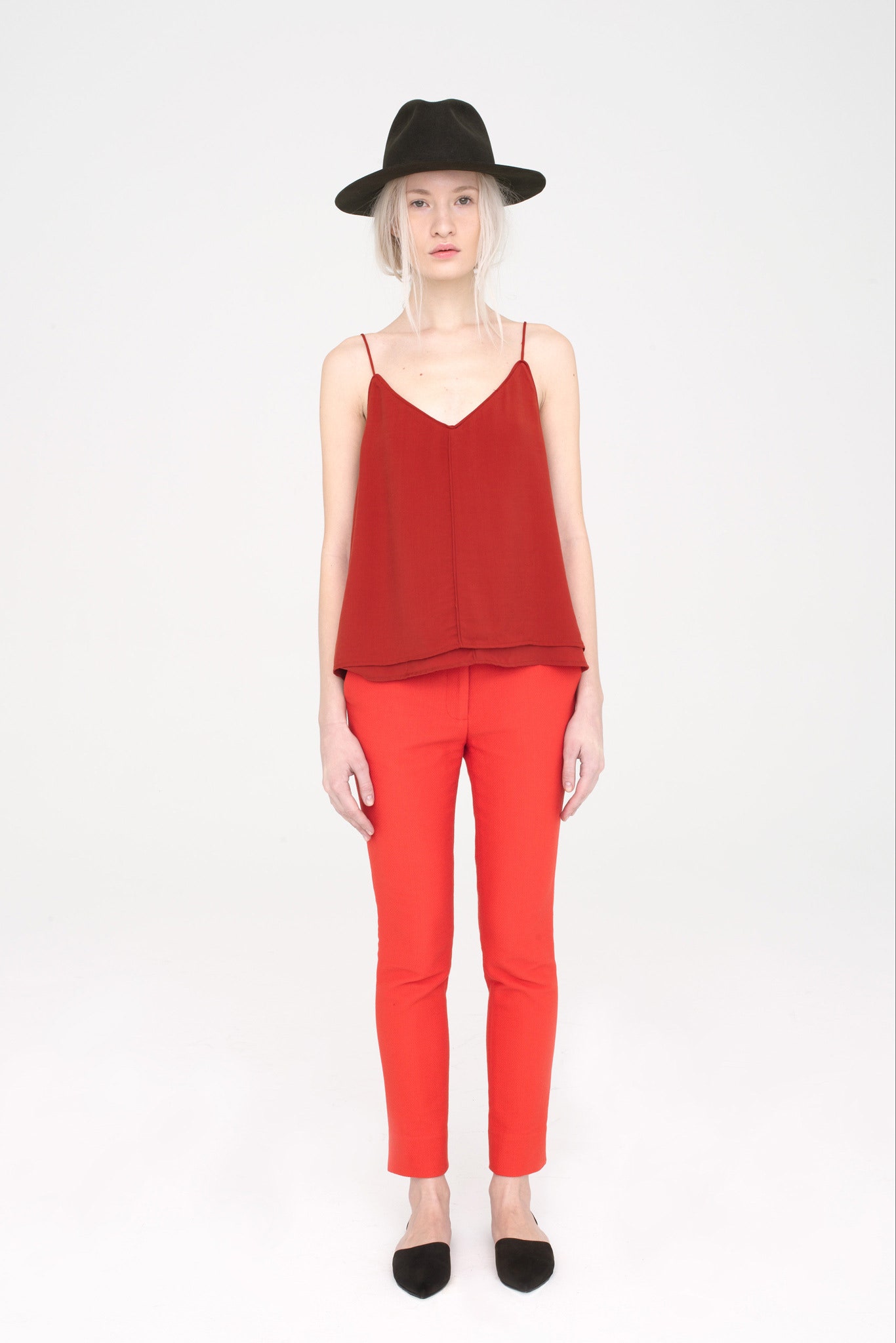 red fitted top with red pants