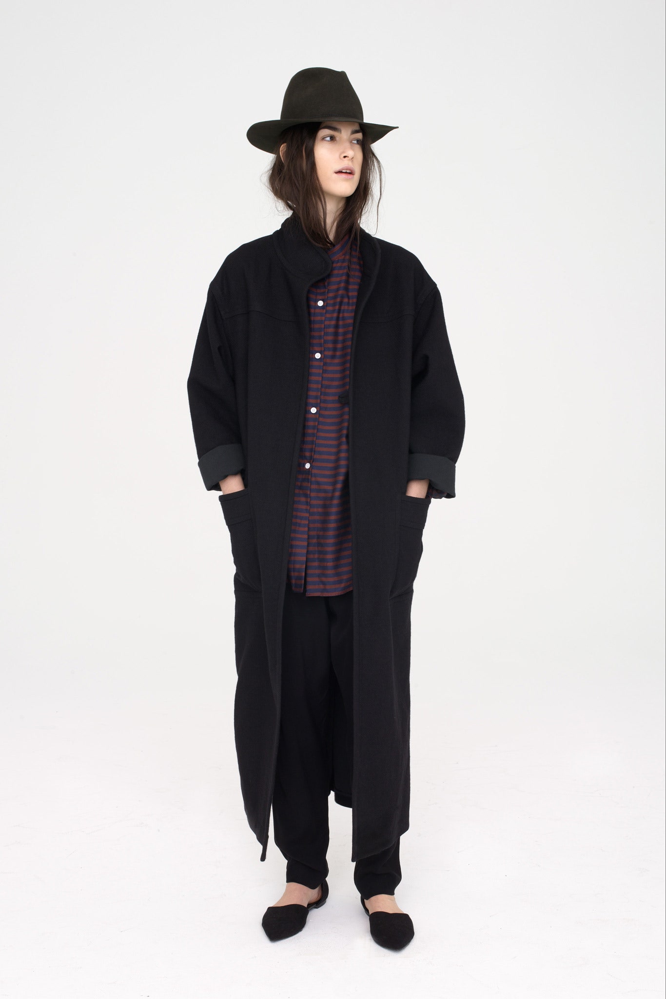 black wool relaxed coat with striped shirt