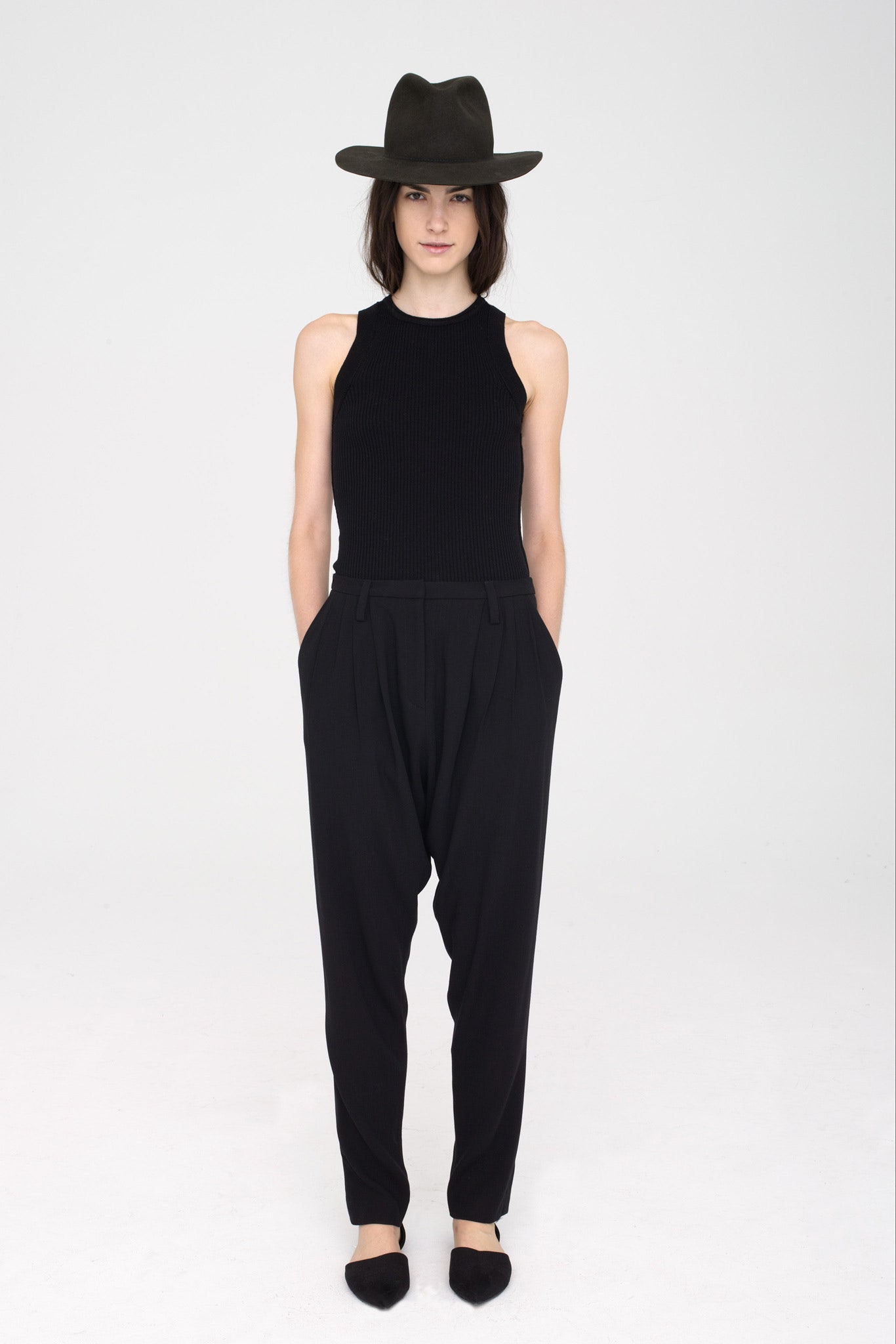 black fitted top and relaxed pants