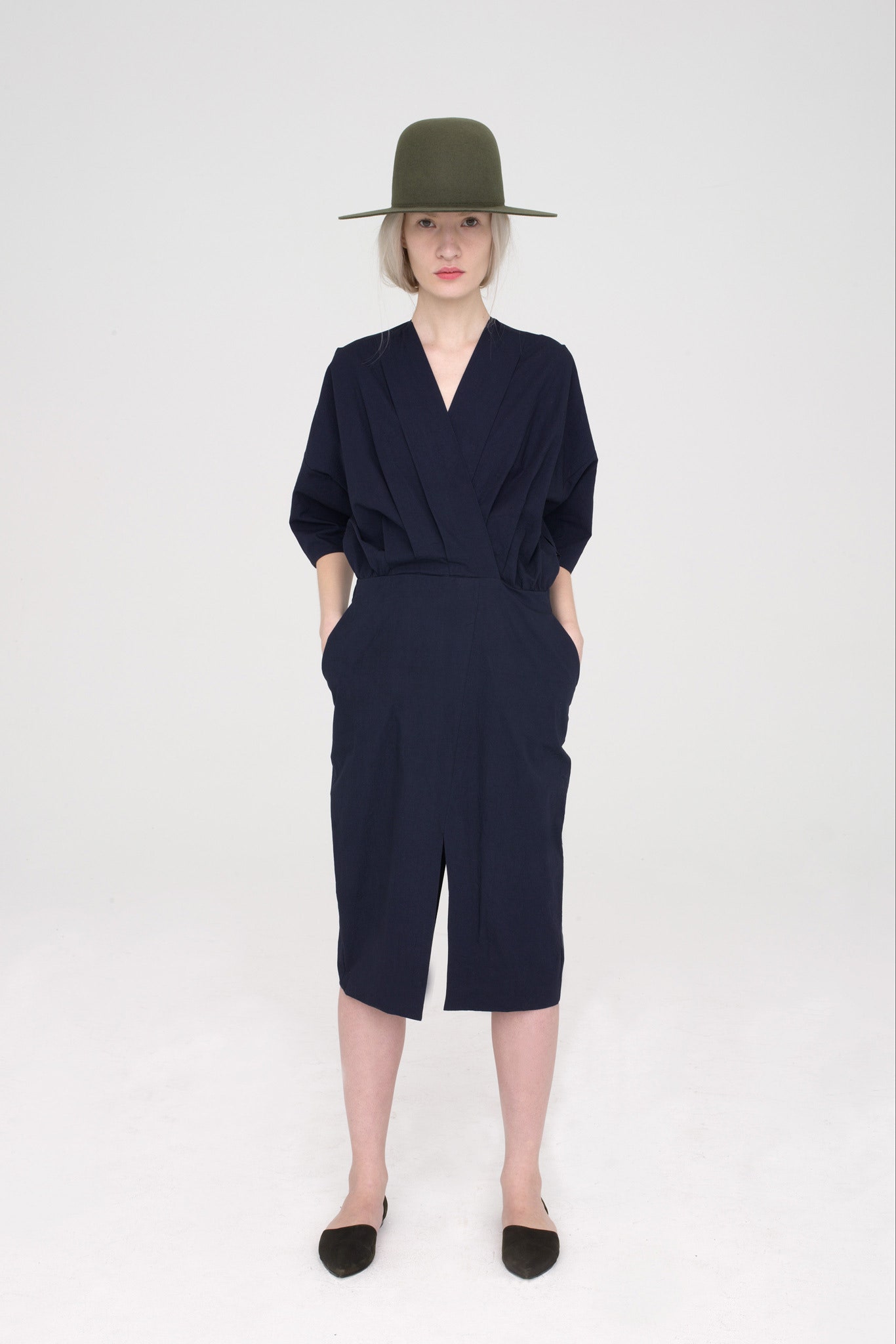navy midi dress with green hat