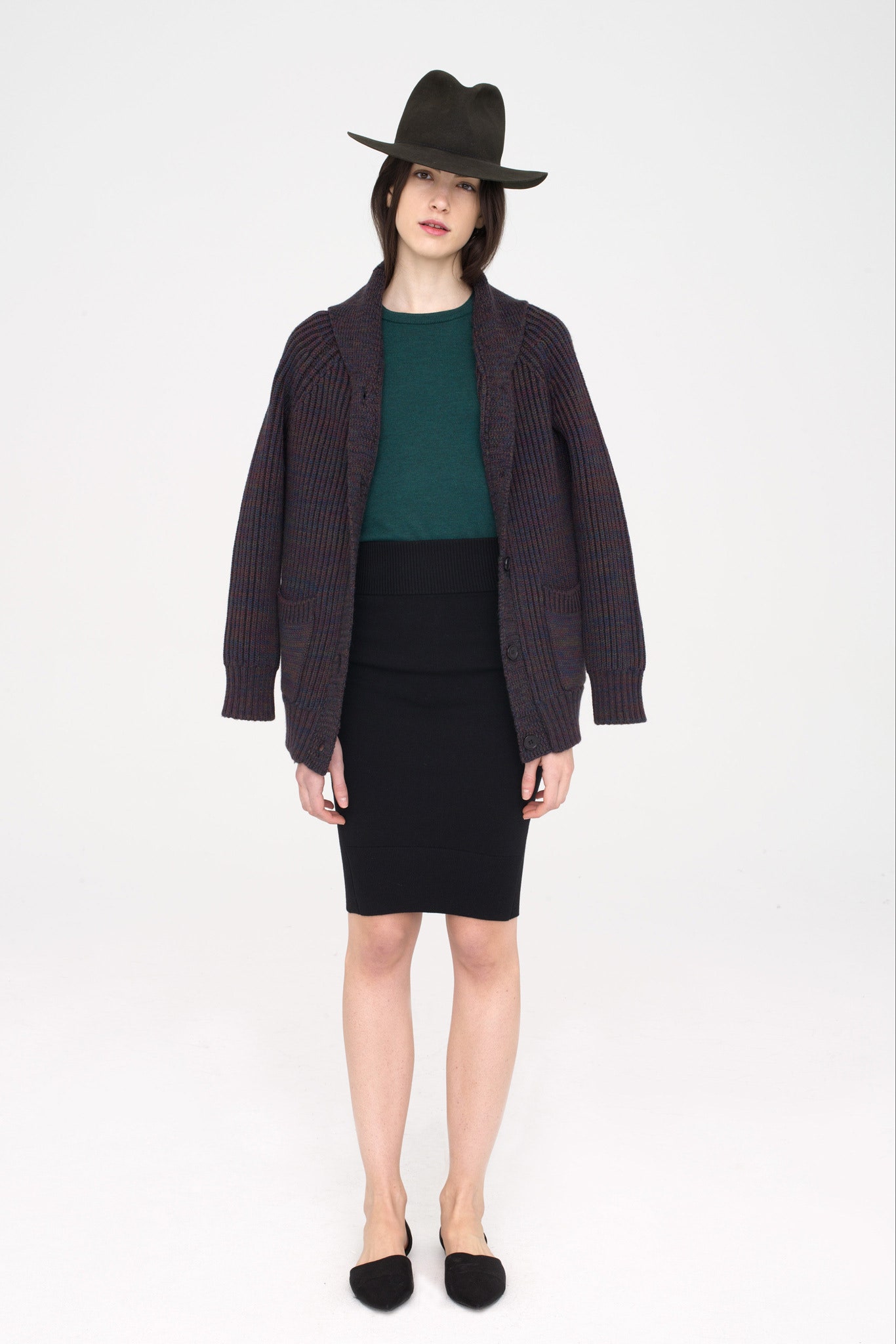 purple cardigan green top black skirt