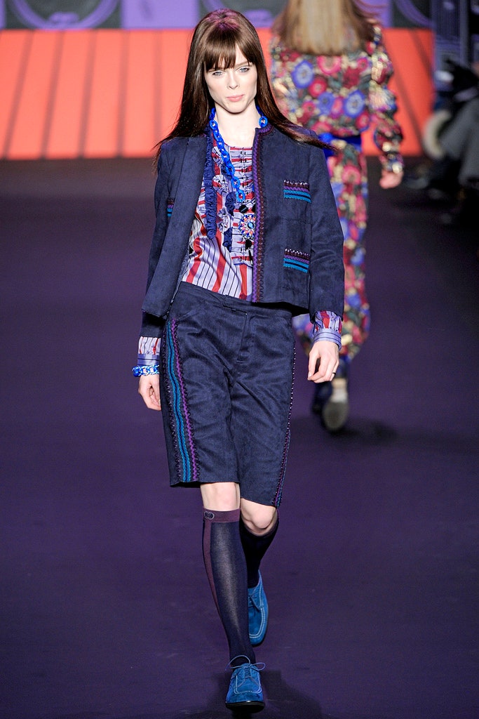 blue fitted jacket and shorts