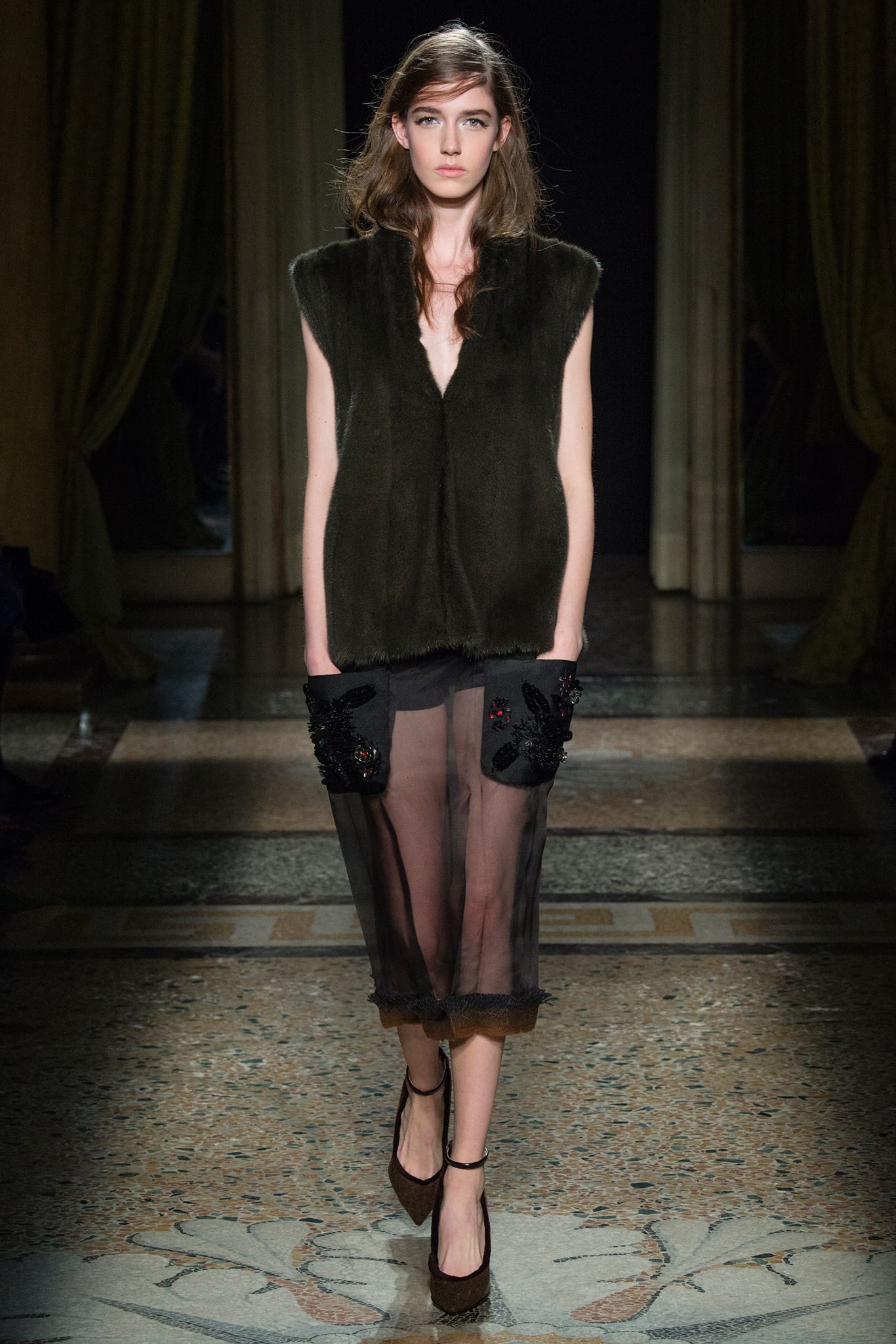 black fur vest and sheer skirt