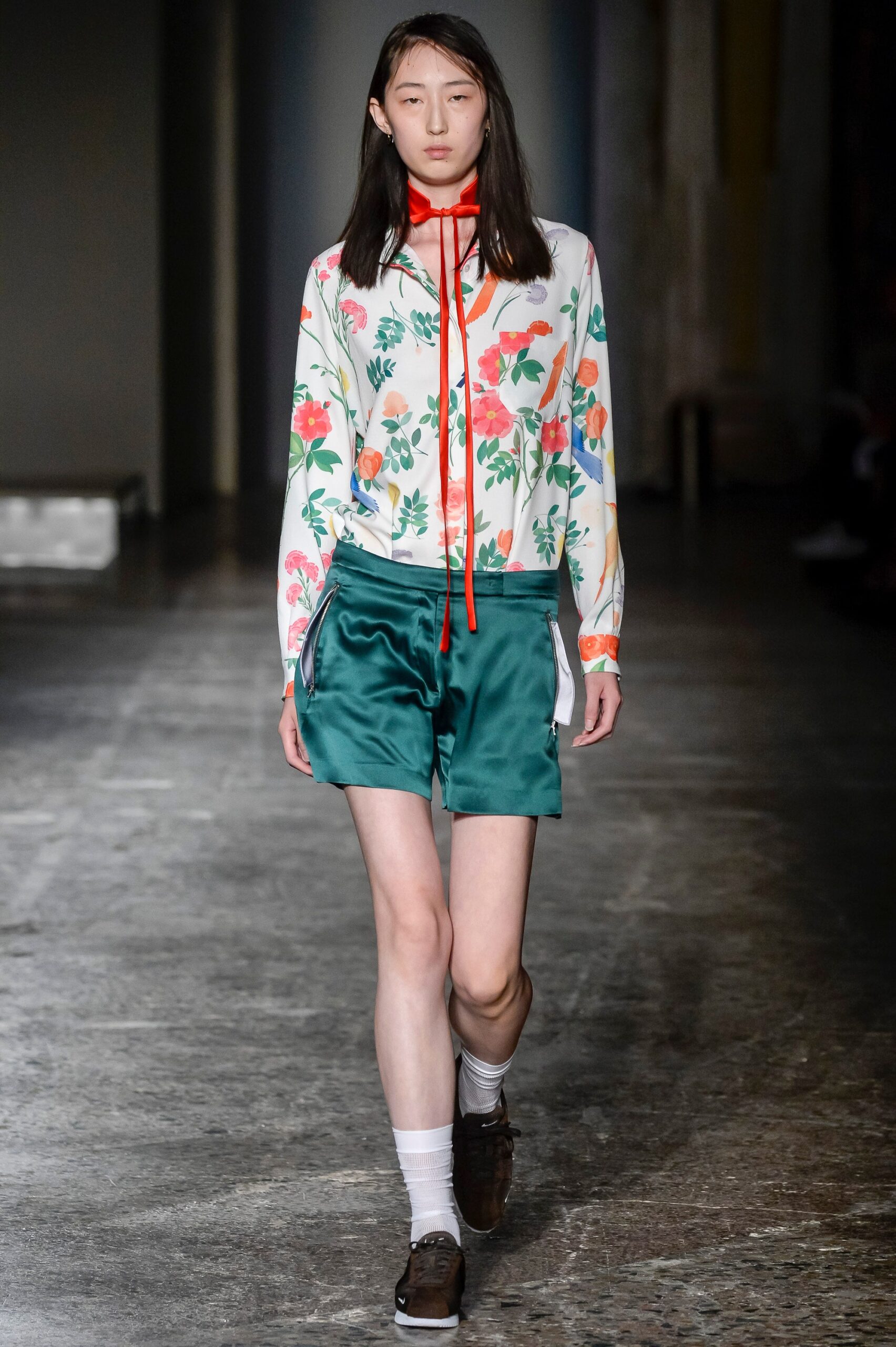 floral shirt with green shorts