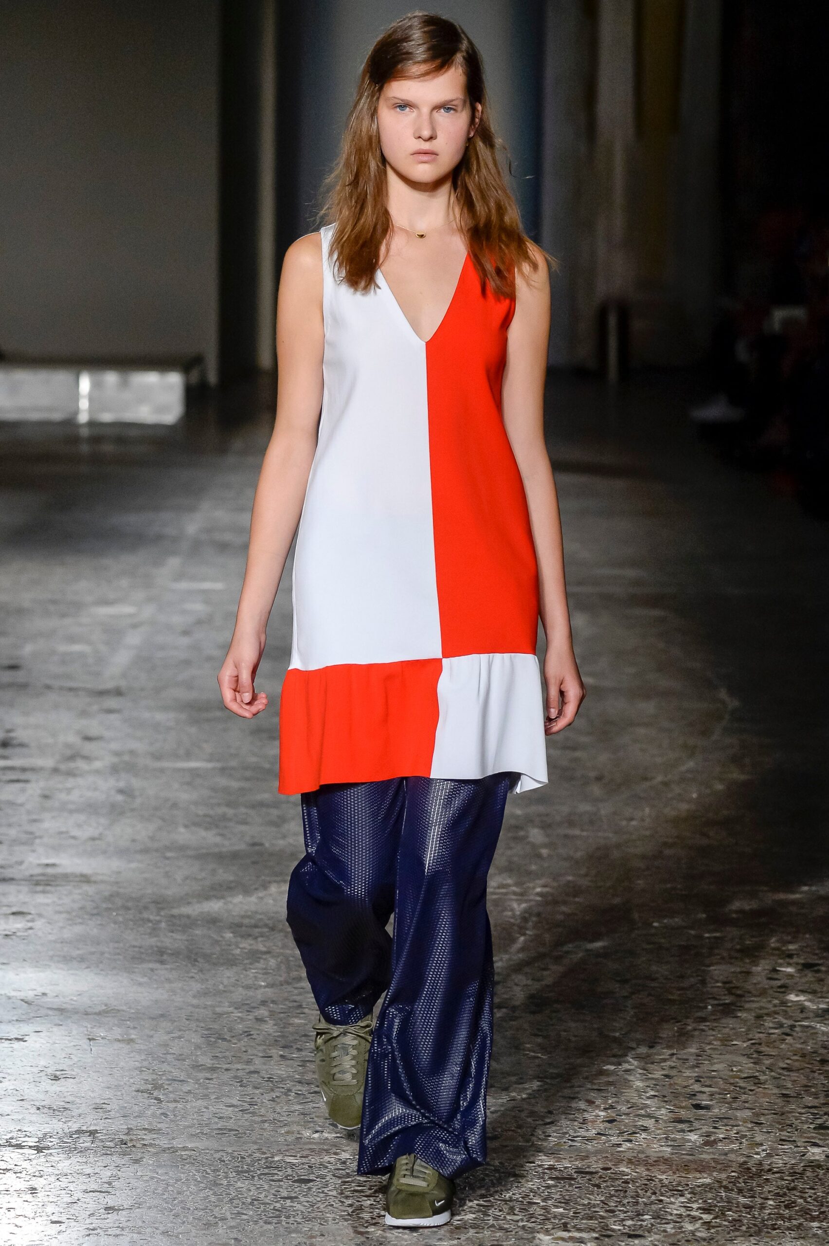 red and white sleeveless dress with blue pants