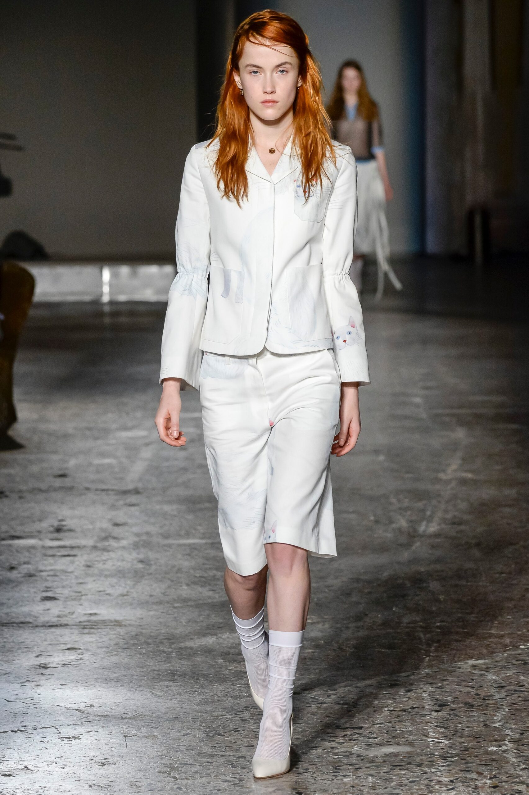 white silk long-sleeve collared fitted buttoned blazer