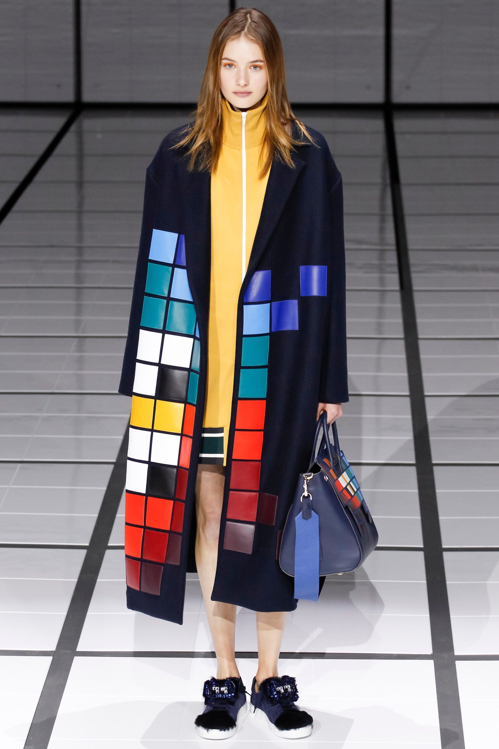 color-blocked coat and yellow dress