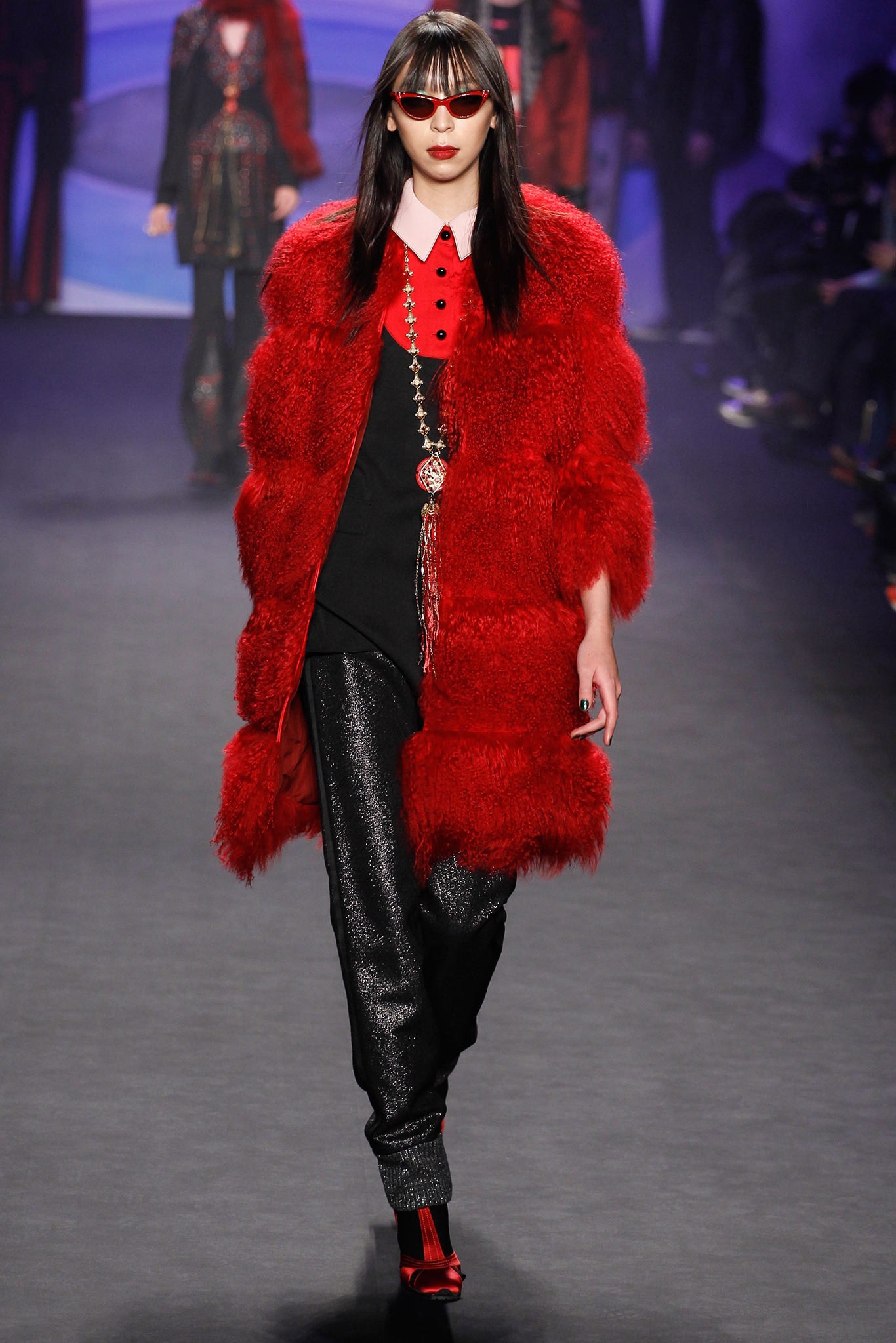red faux-fur coat with black shirt