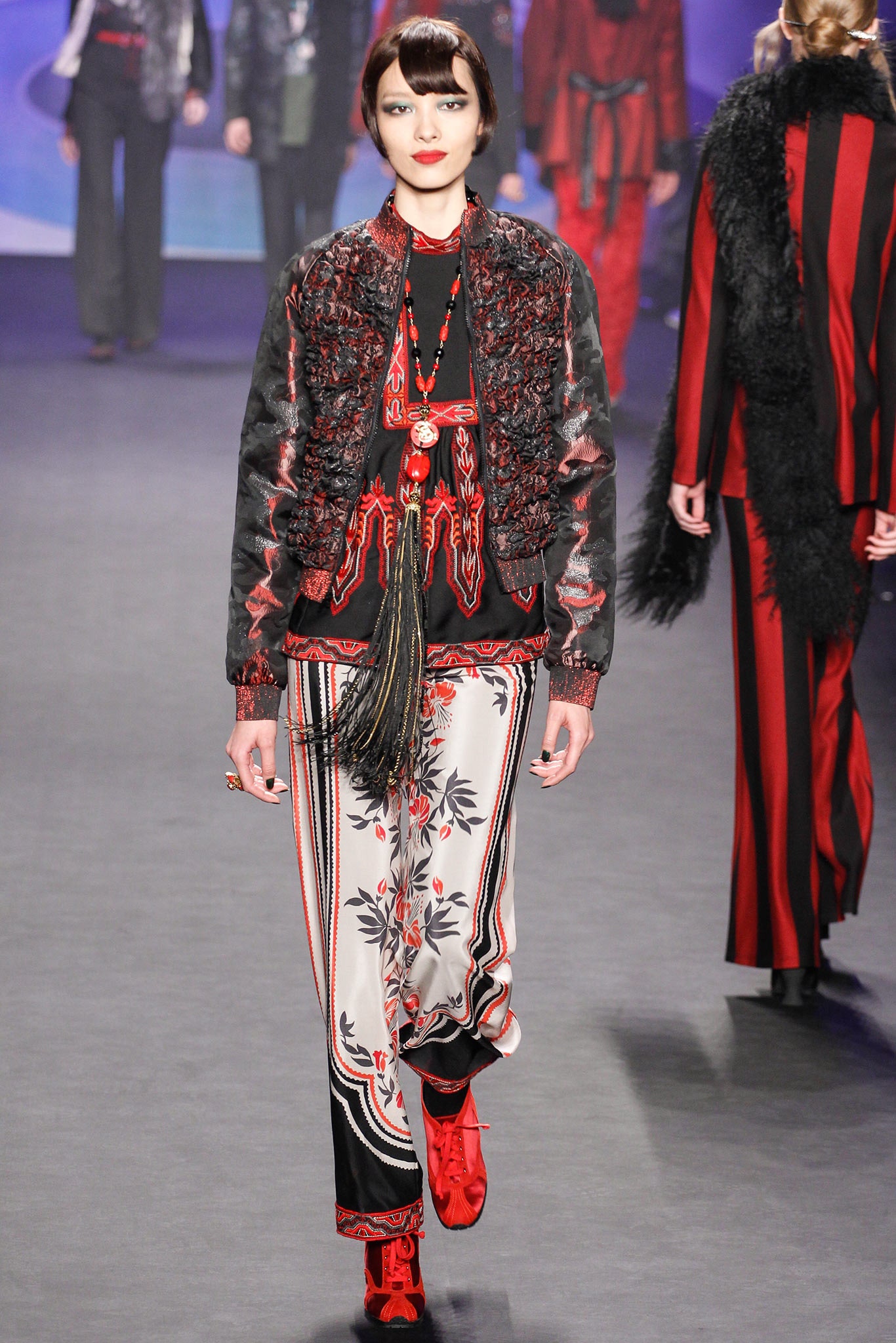 embroidered black jacket with printed pants