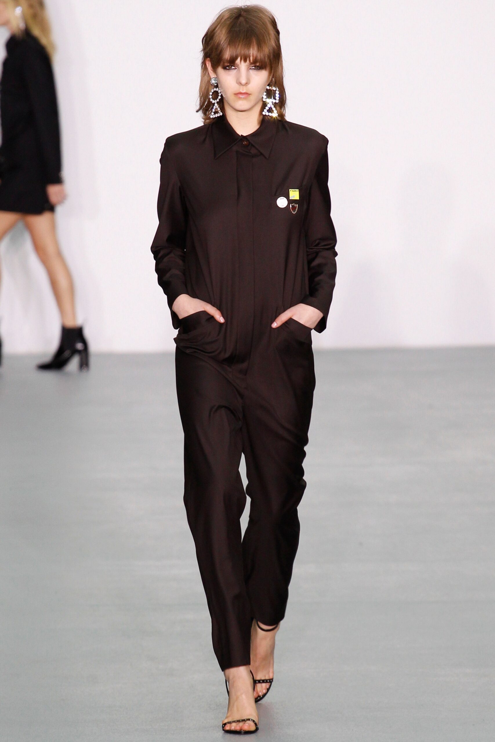 black fitted jumpsuit with pockets