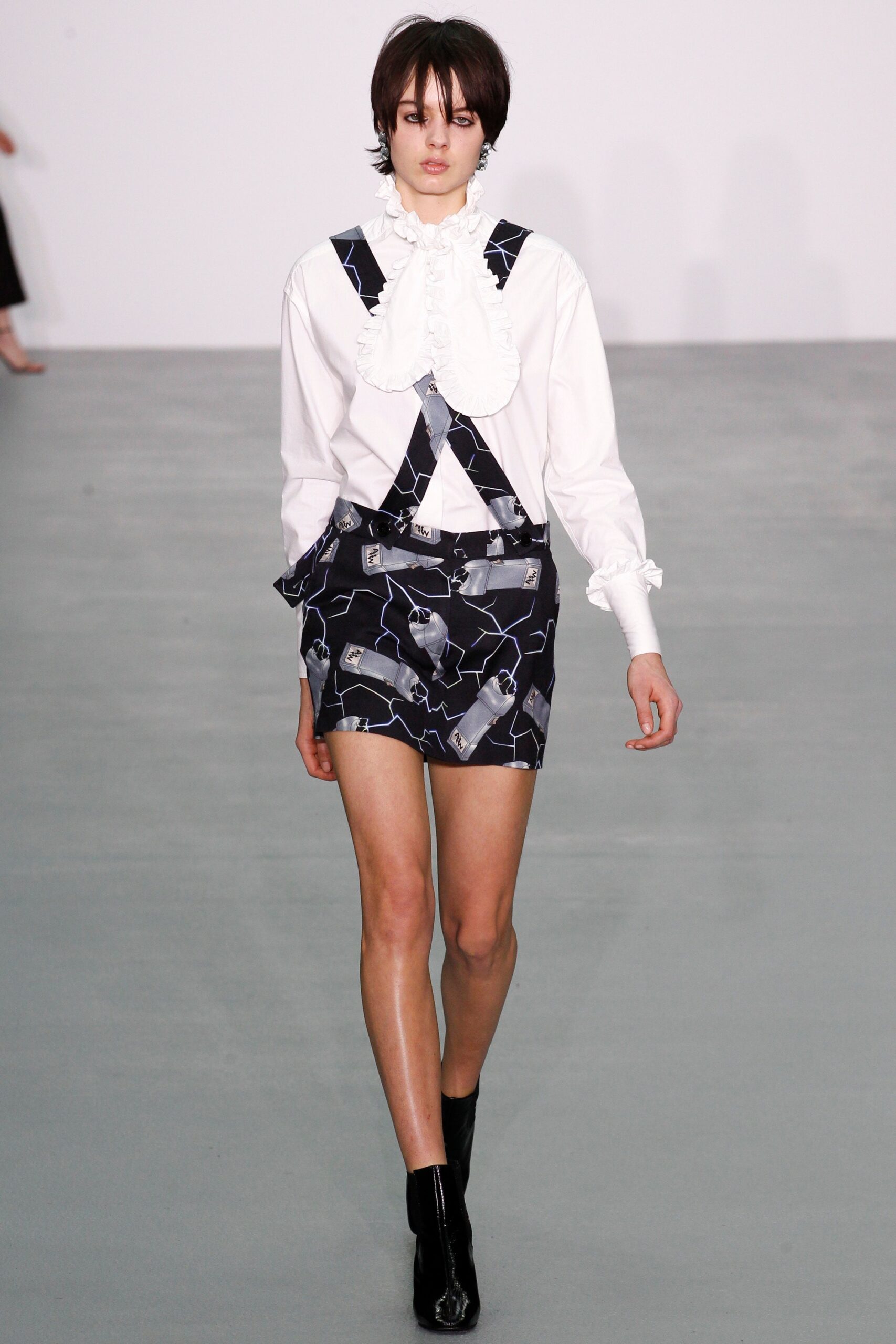 white ruffled shirt with black dress