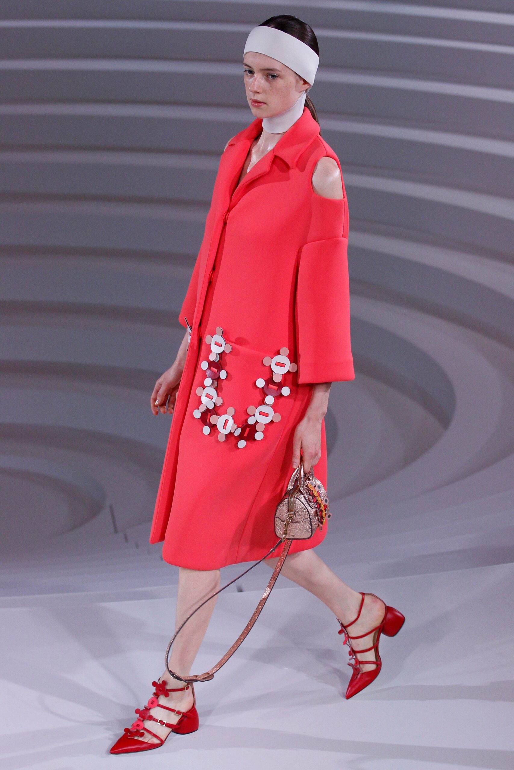 pink relaxed coat with red shoes