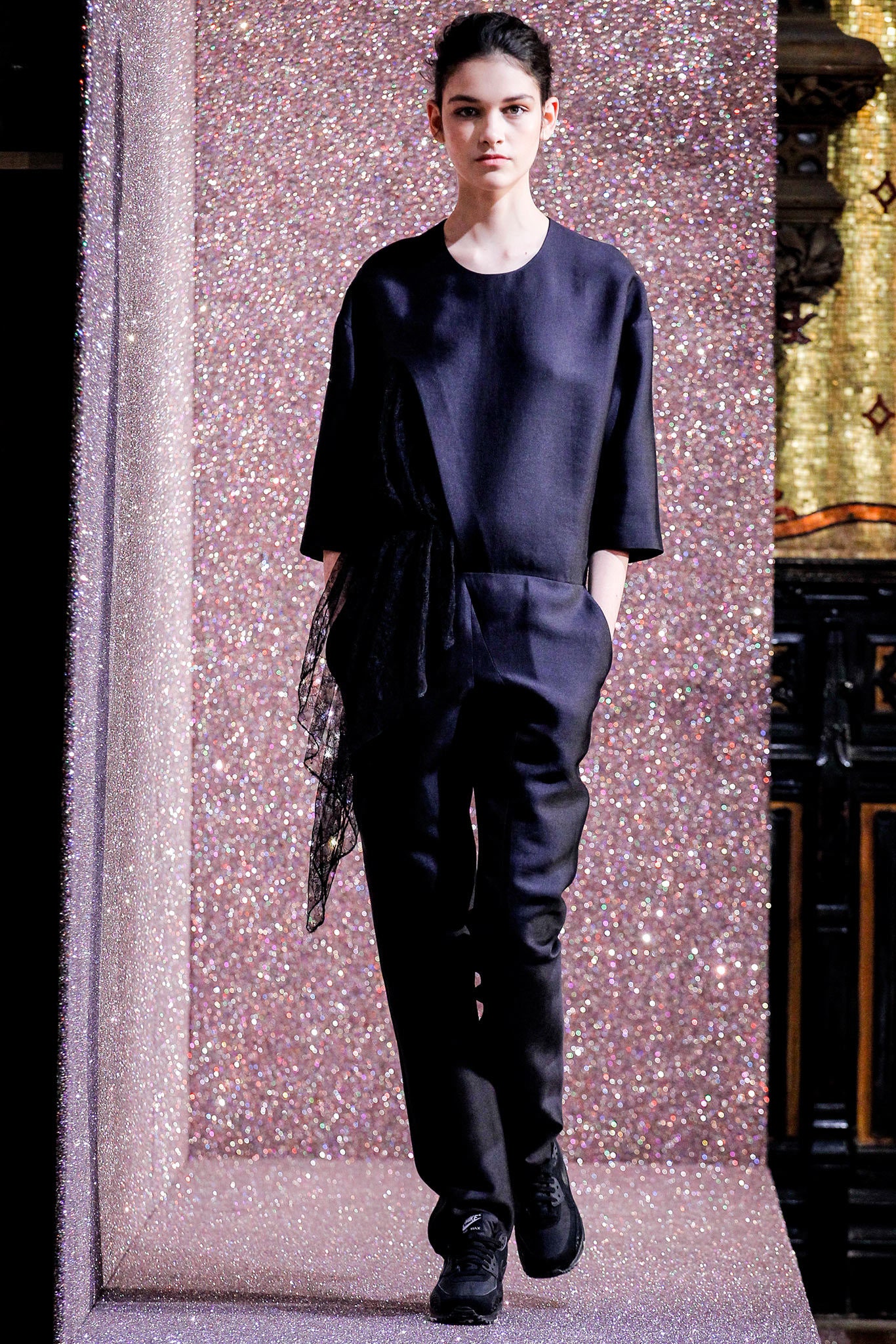 black silk relaxed top and fitted pants