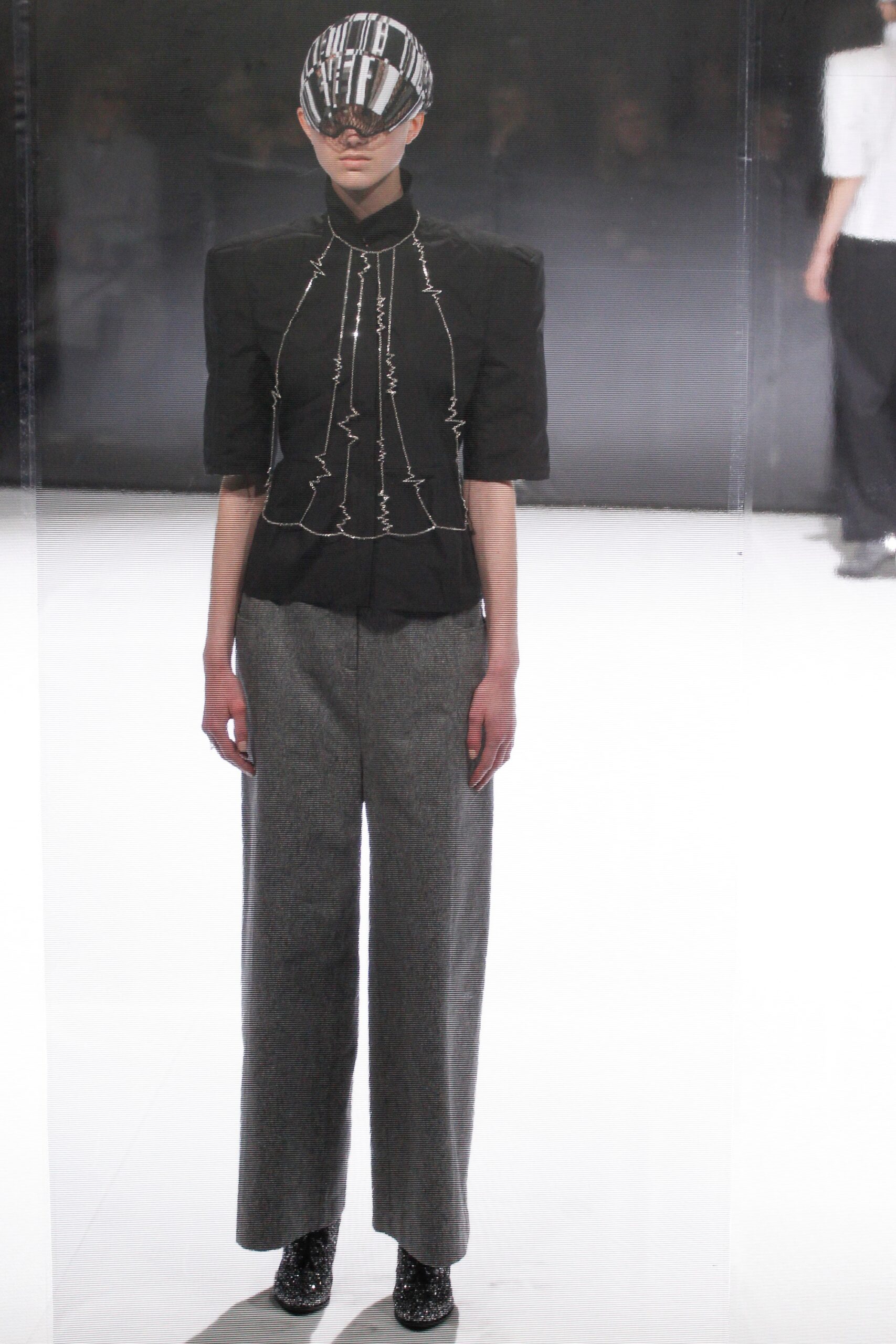 black fitted blouse with gray pants