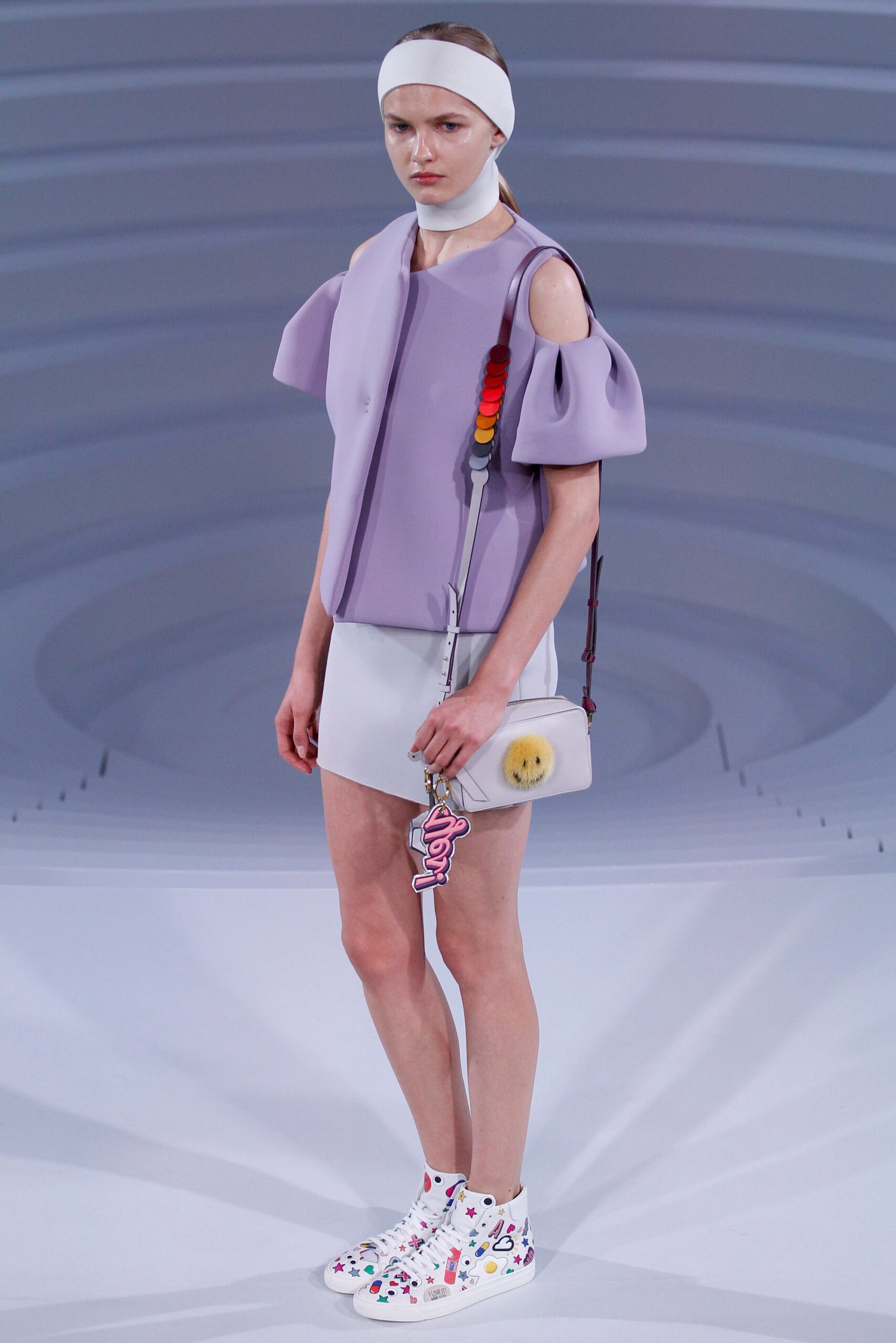 purple fitted top with mini skirt