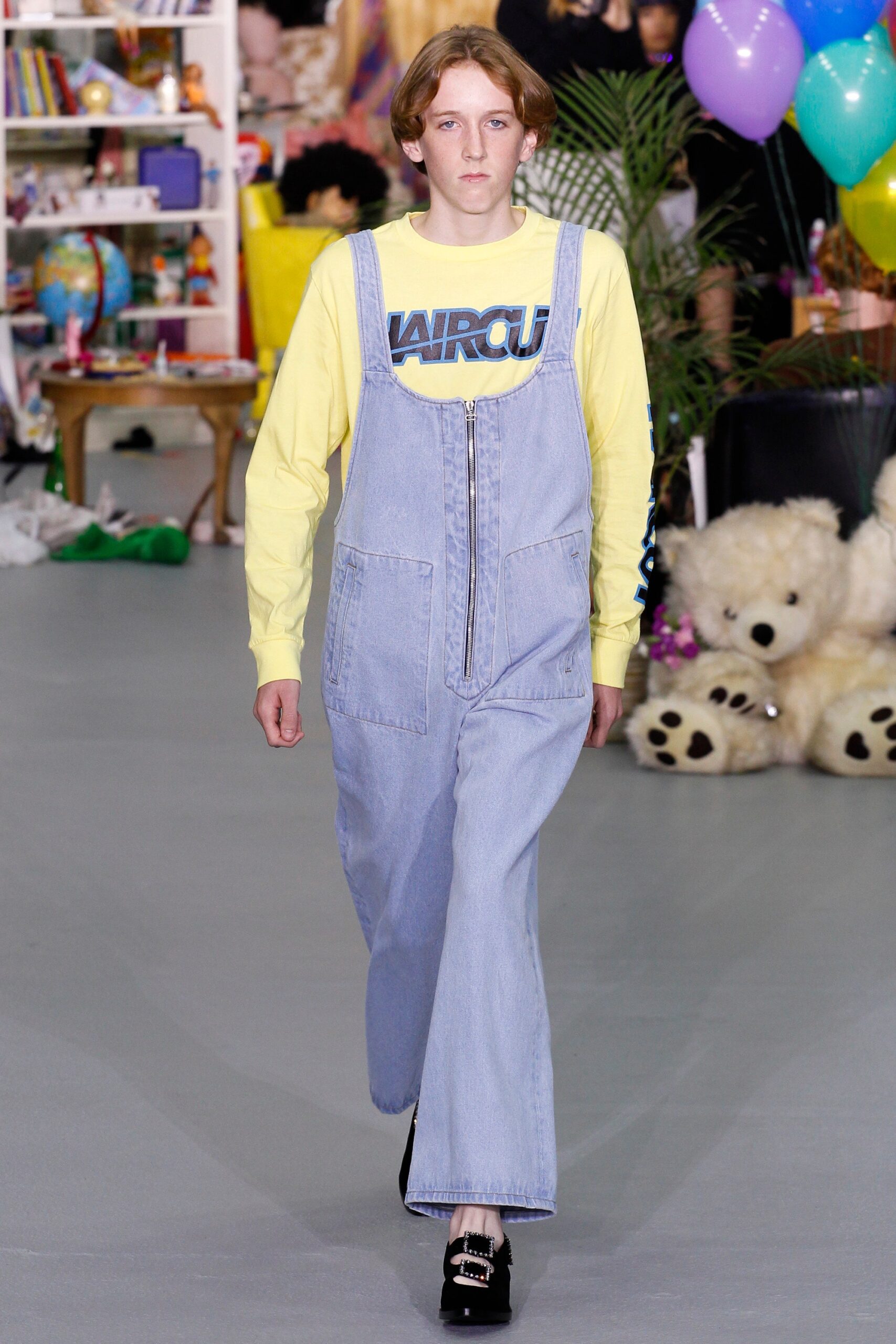 blue denim overalls with yellow t-shirt