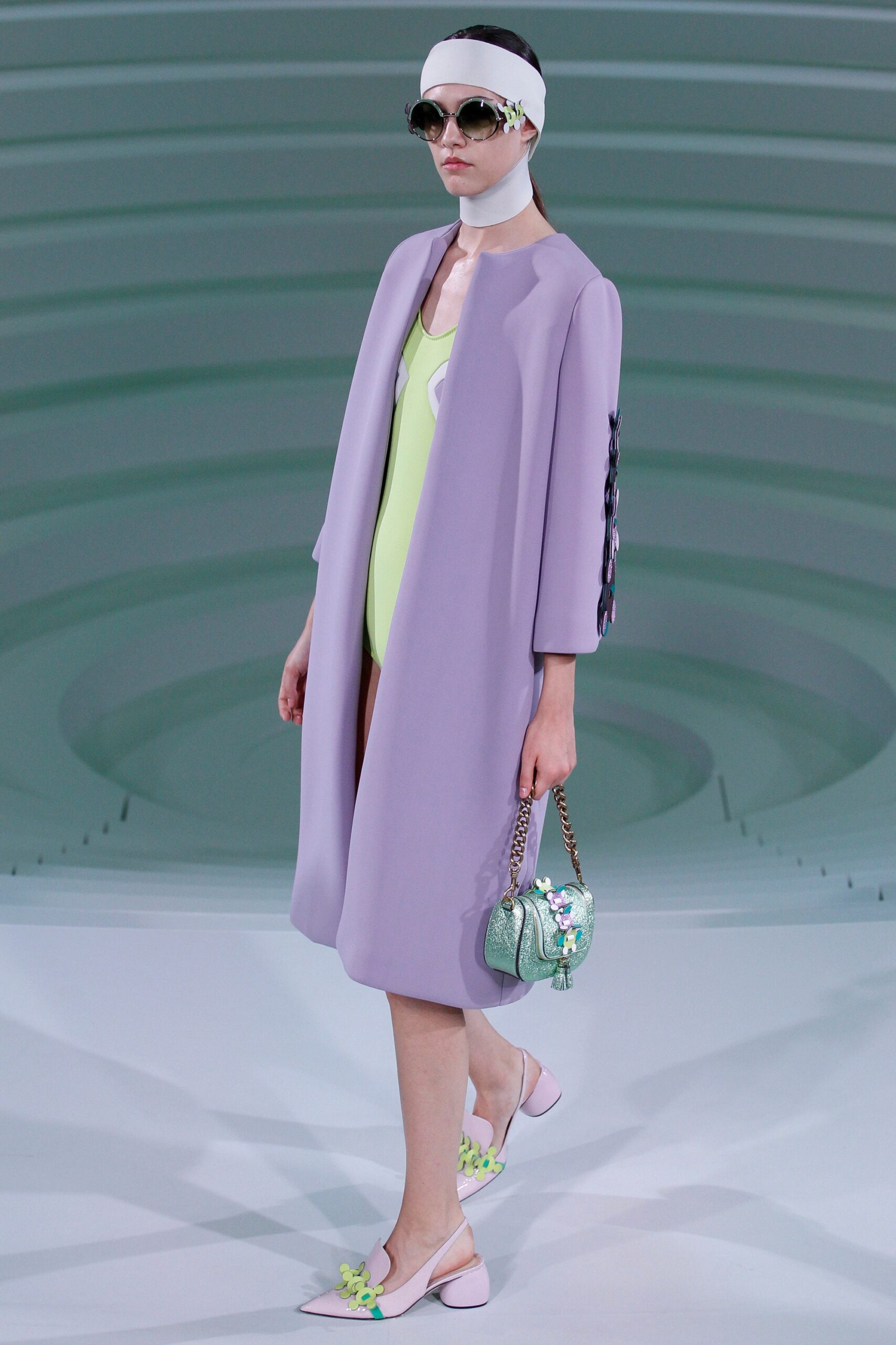 lavender coat and green swimsuit