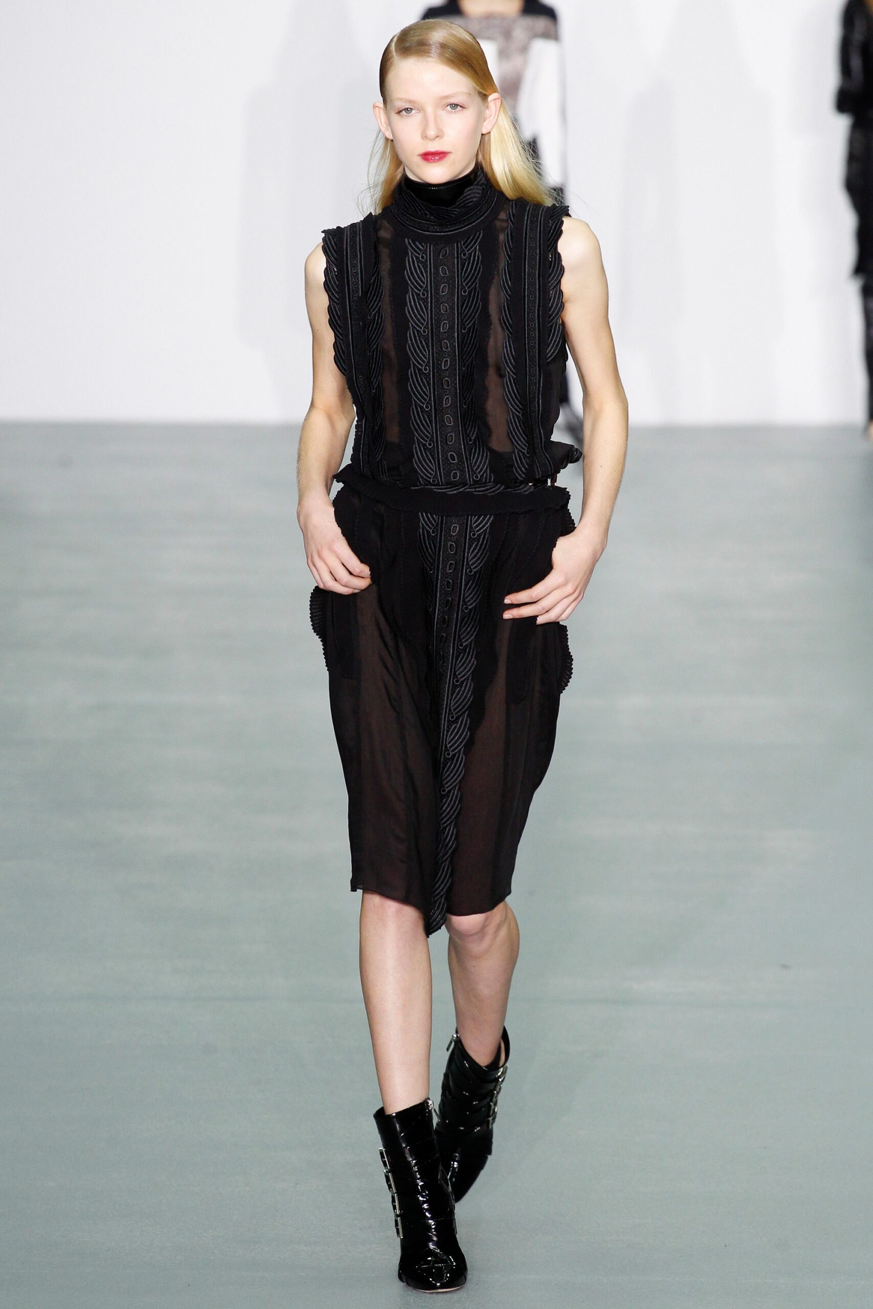 black pleated midi dress with boots