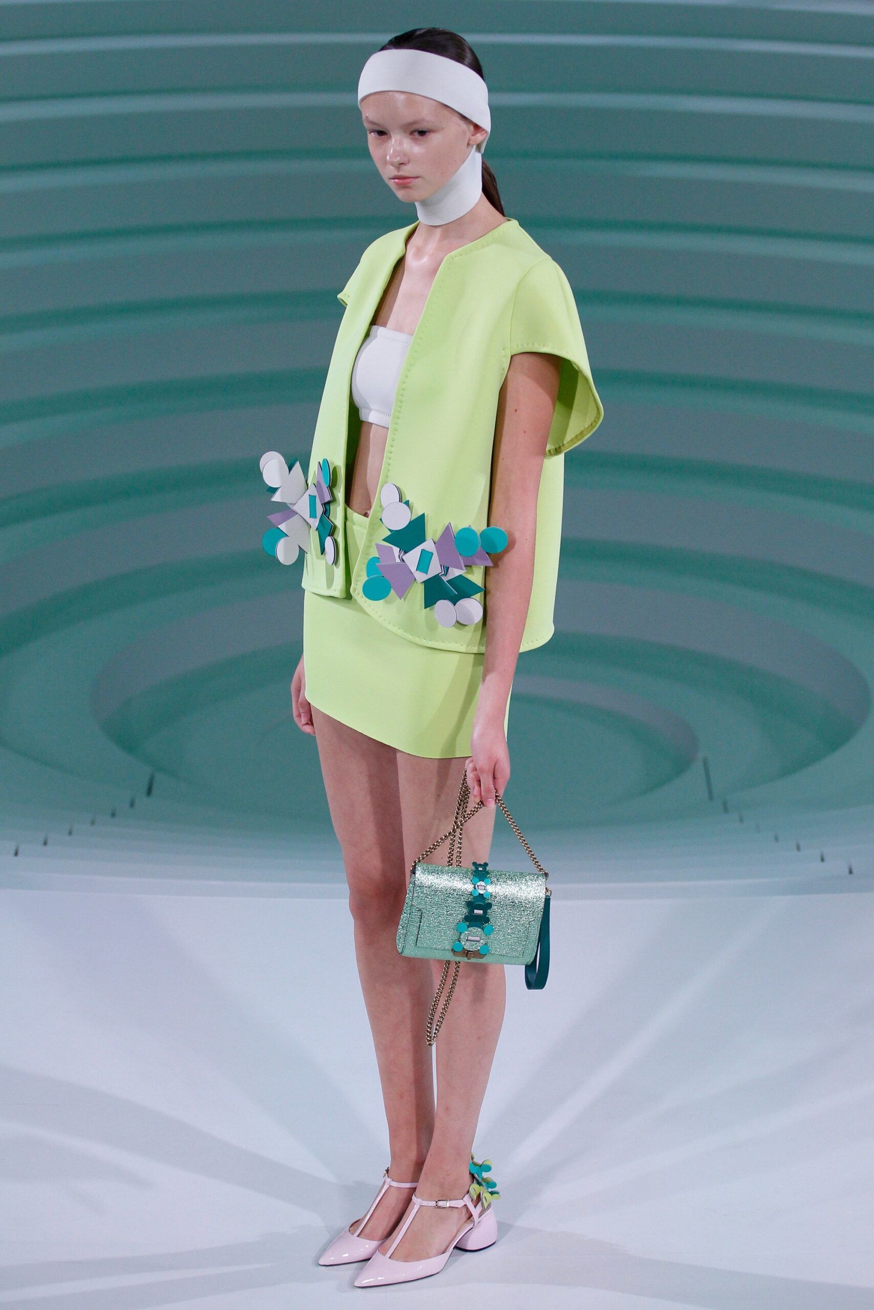 yellow green sleeveless top and mini skirt