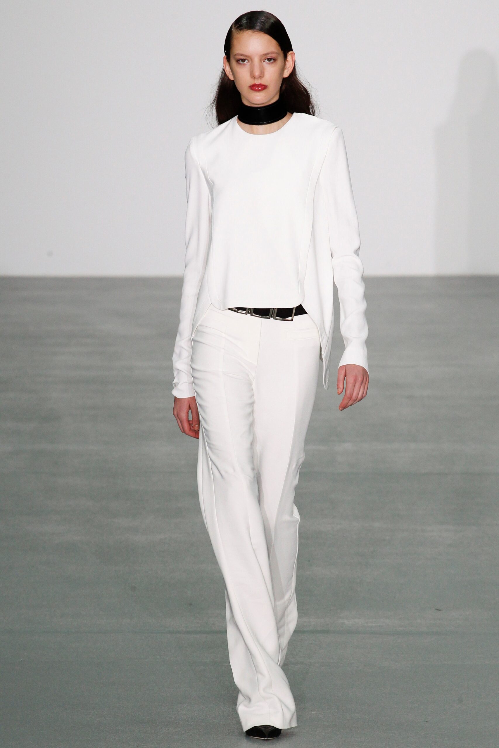 fitted white top and tailored pants