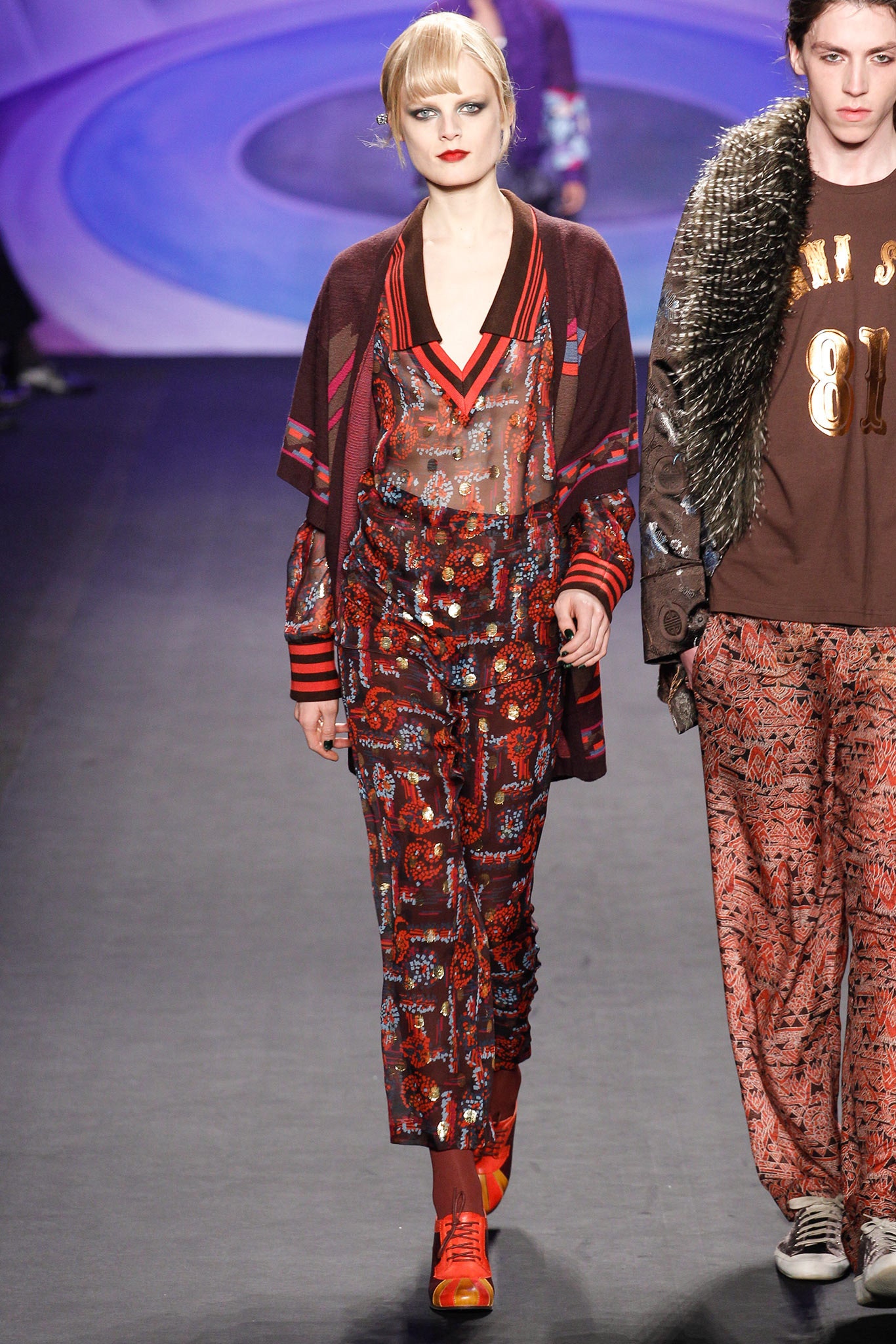 red multi-patterned silk top and pants