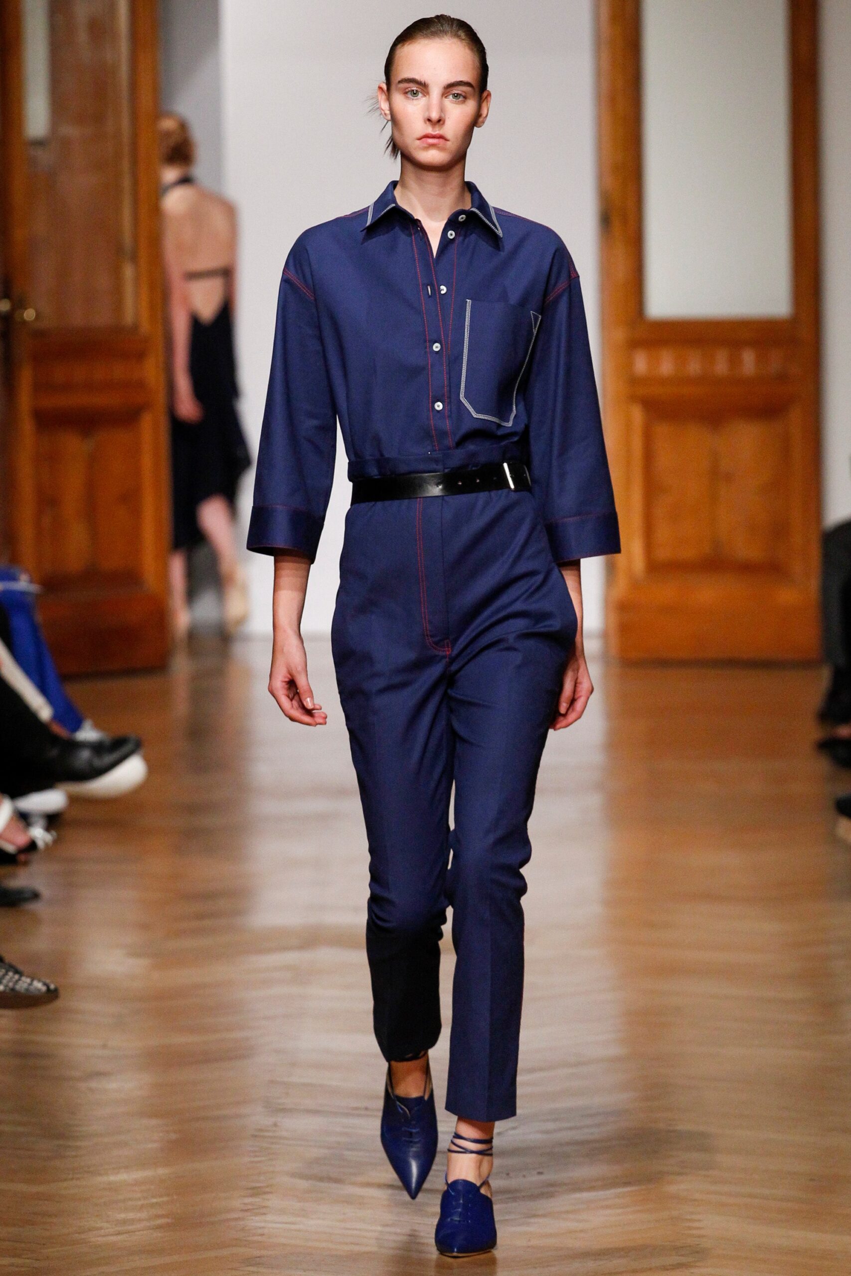blue cotton long-sleeve collared fitted zippered pockets jumpsuit