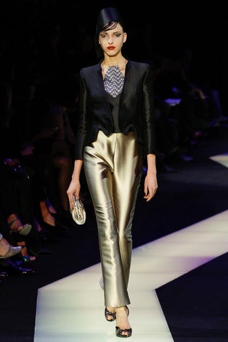 black silk blazer and gold pants