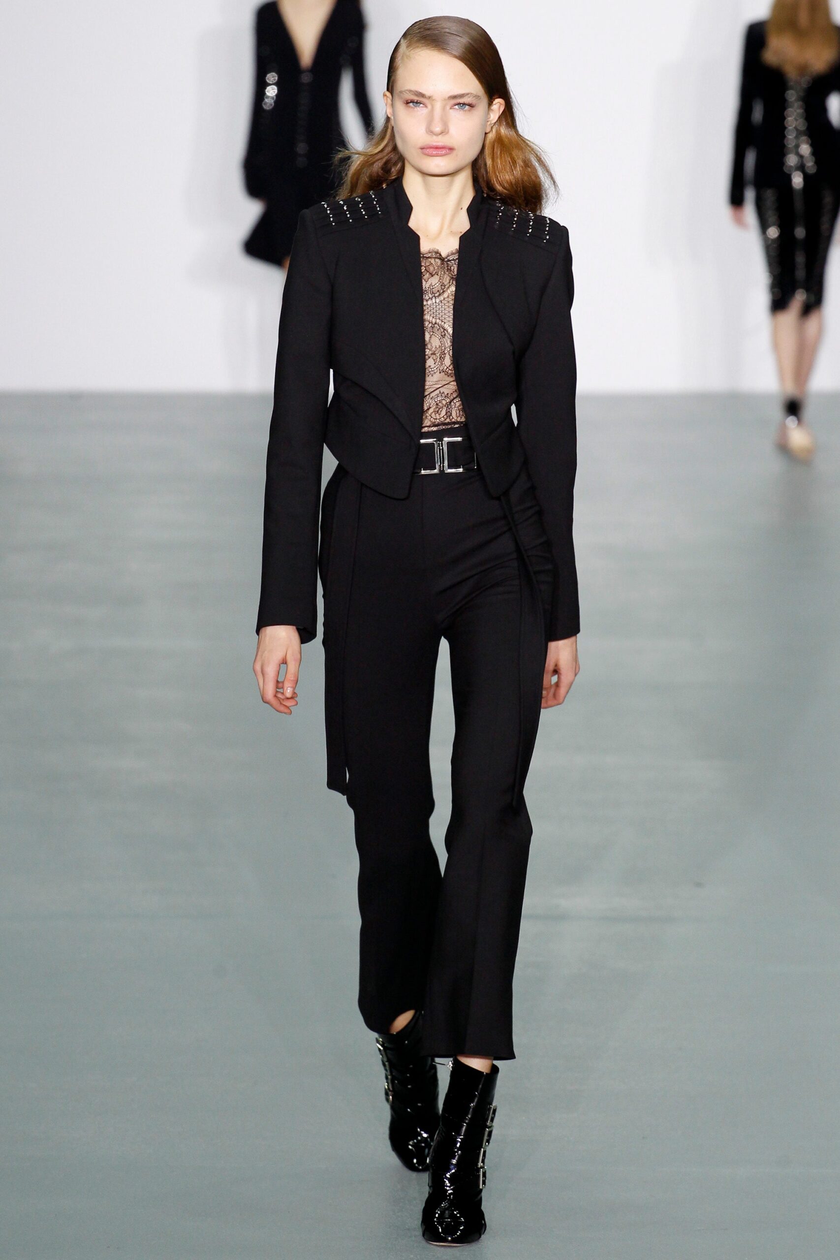 black tailored blazer and fitted pants