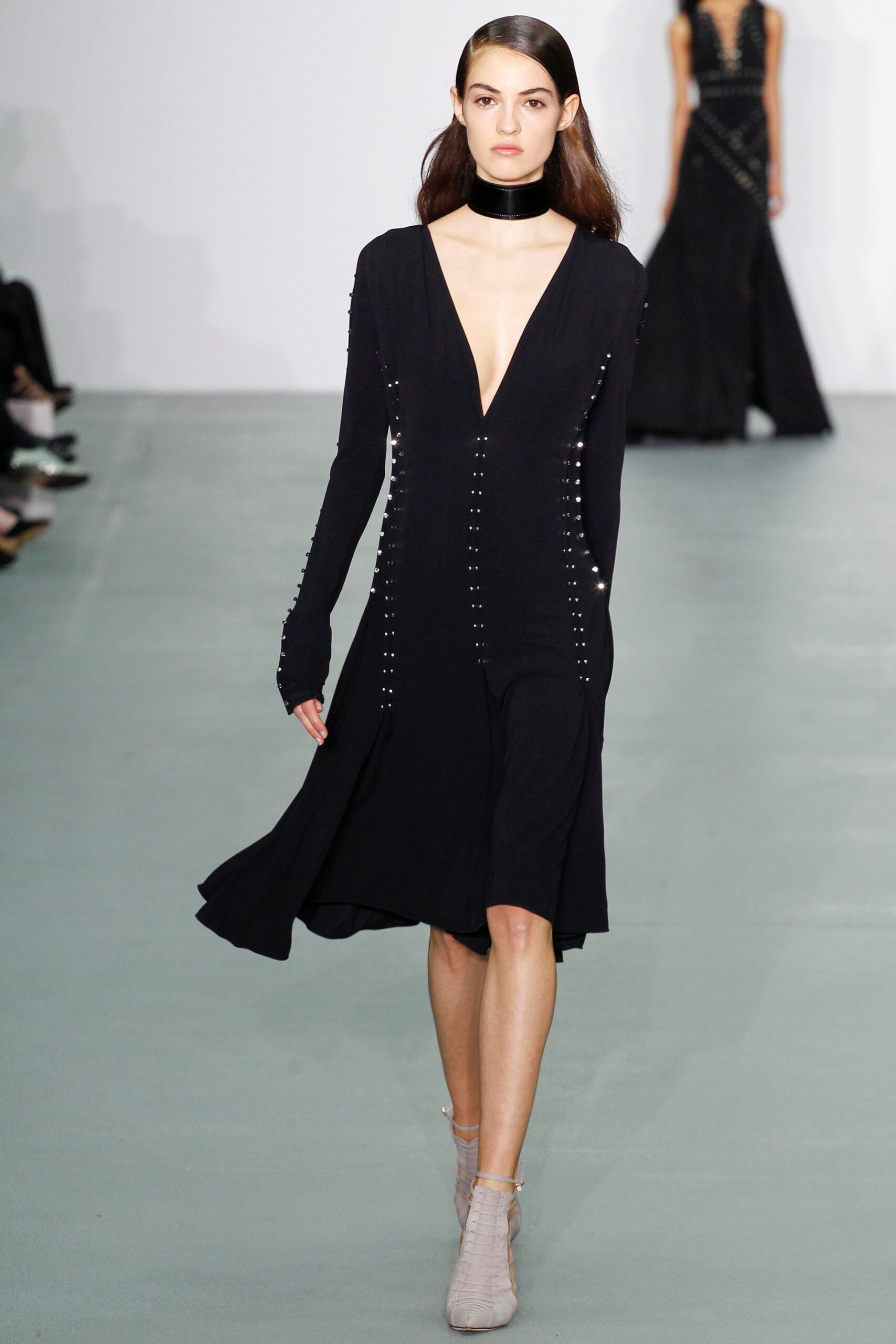black fitted long-sleeve dress