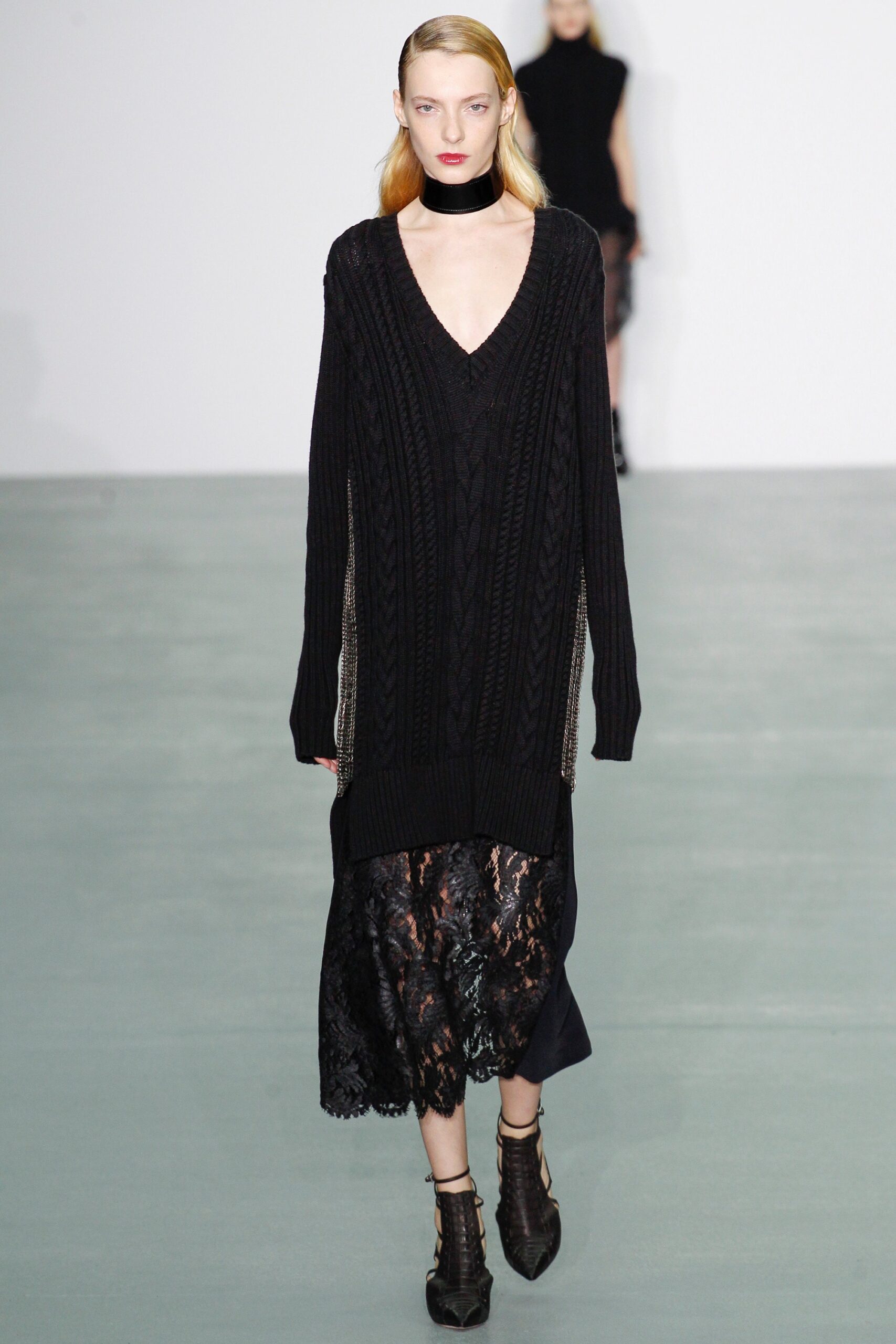 black relaxed sweater and lace dress