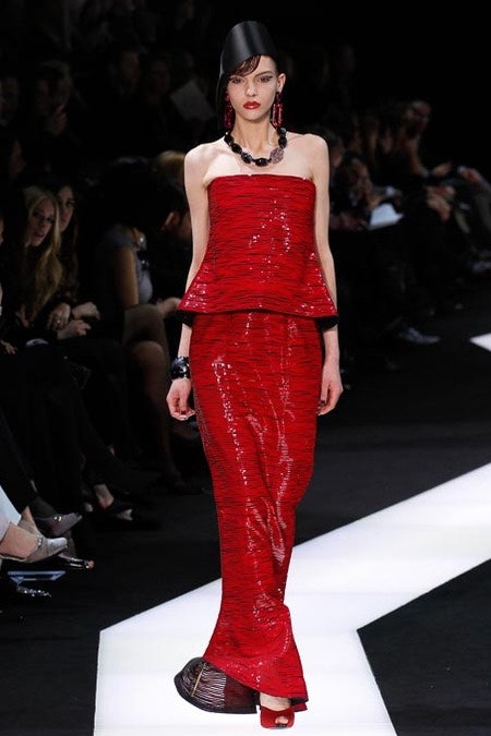 red pleated strapless gown