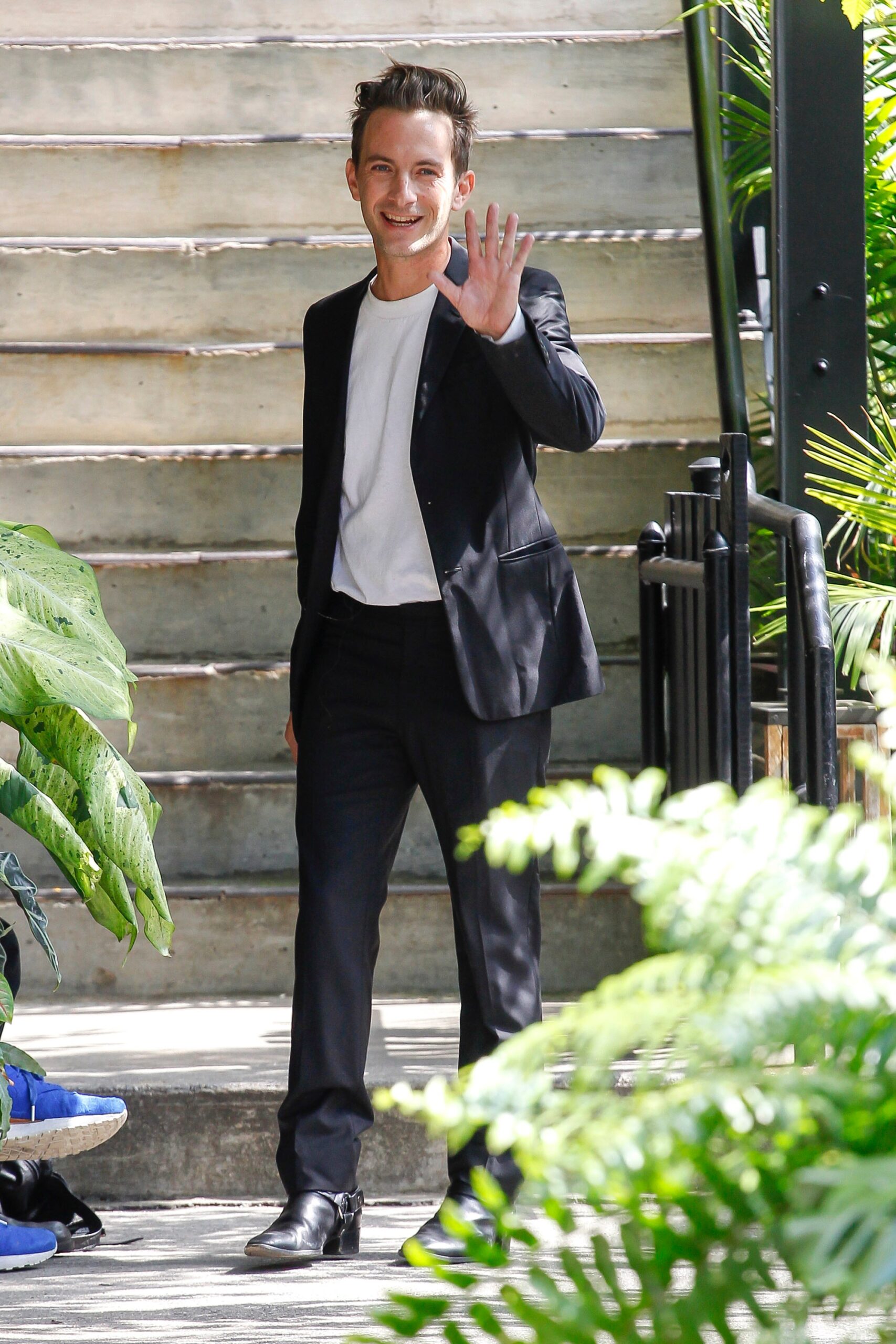 black tailored suit with white t-shirt