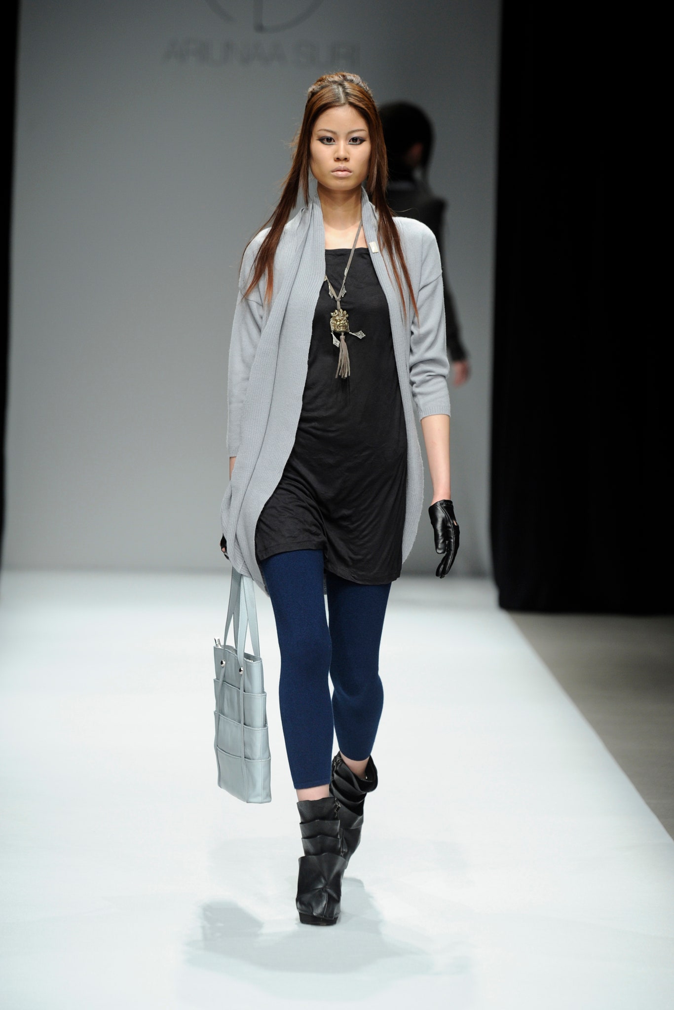 black fitted top with gray cardigan