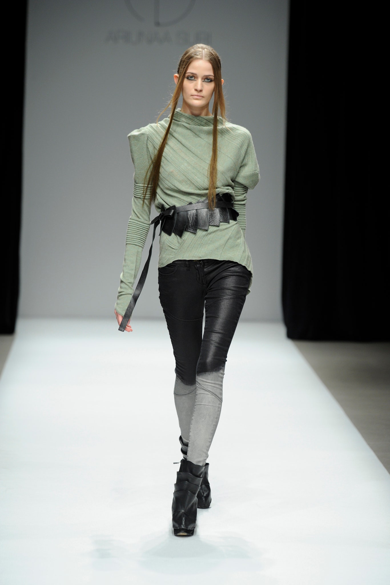 fitted green top with black pants