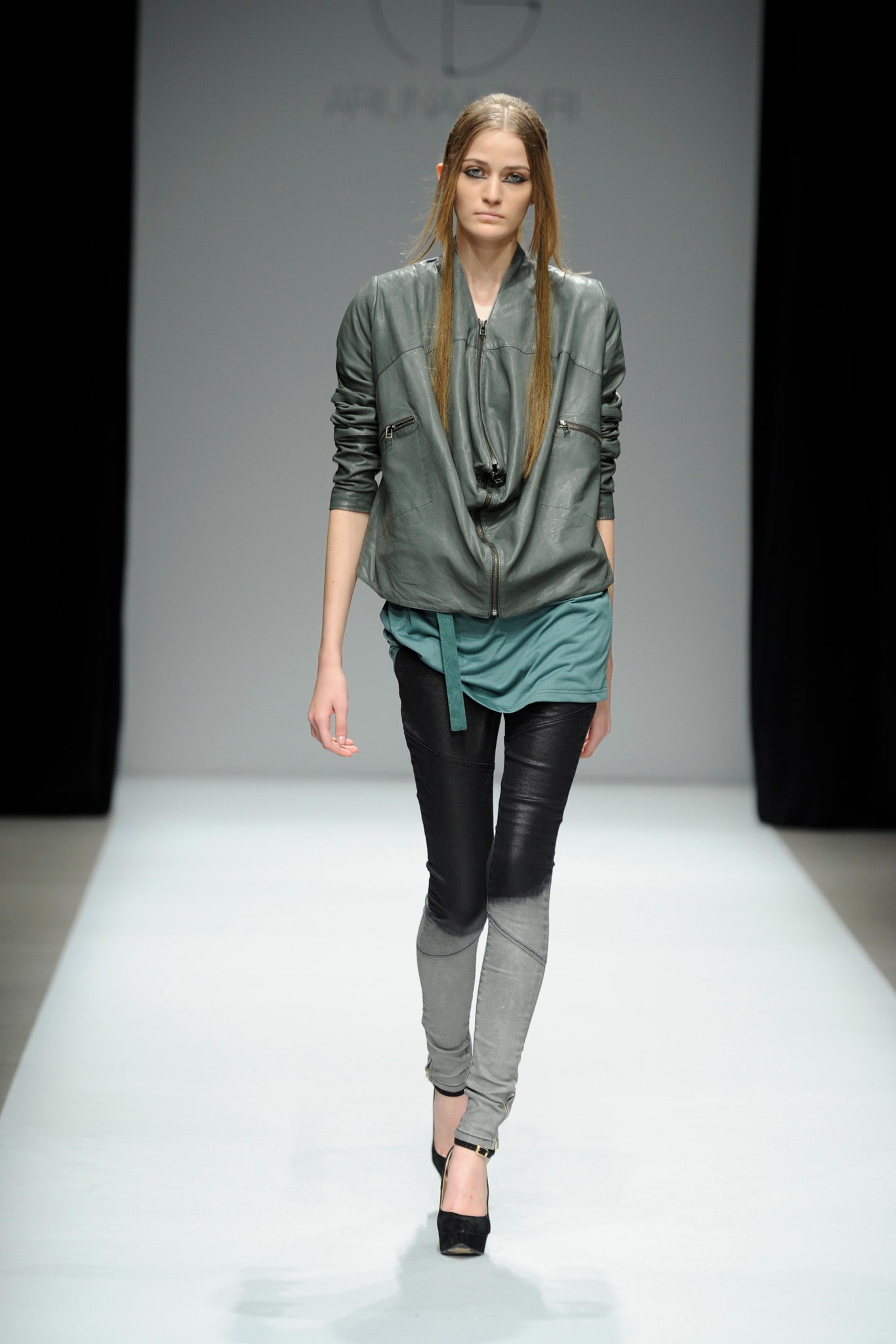 gray leather jacket with teal top