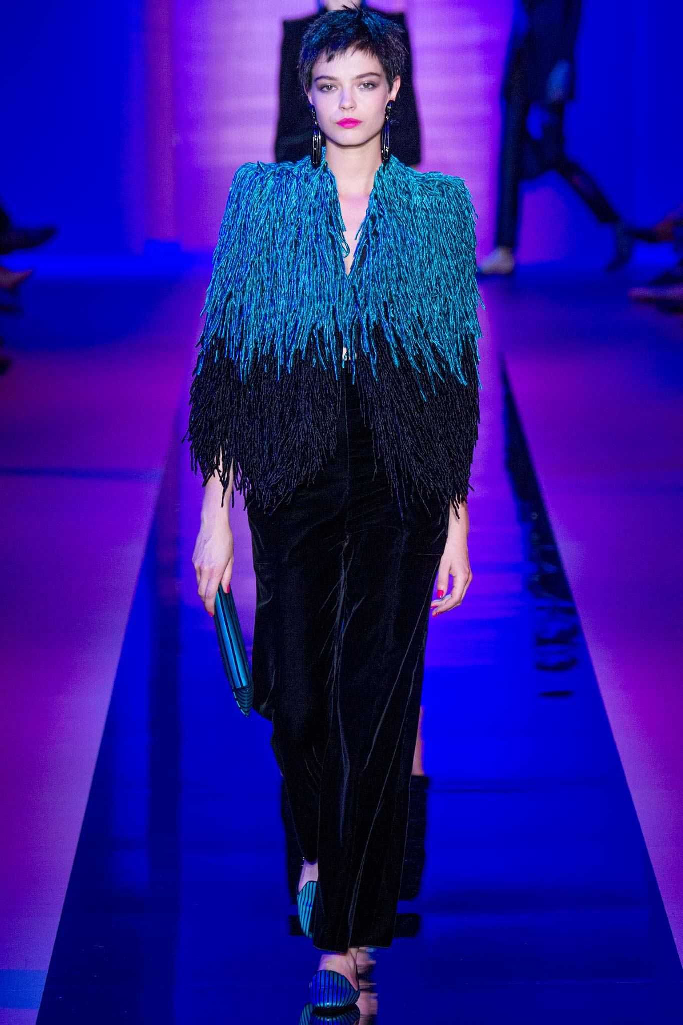 fringed blue and black jacket with velvet pants