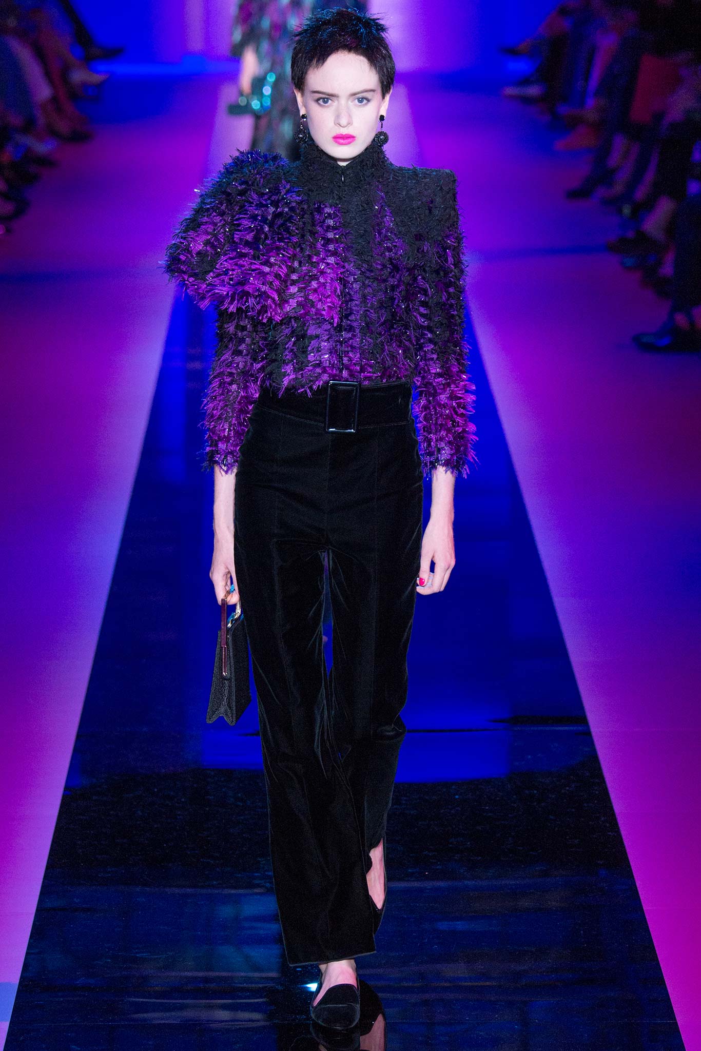 fitted purple ruffled top with tailored black pants