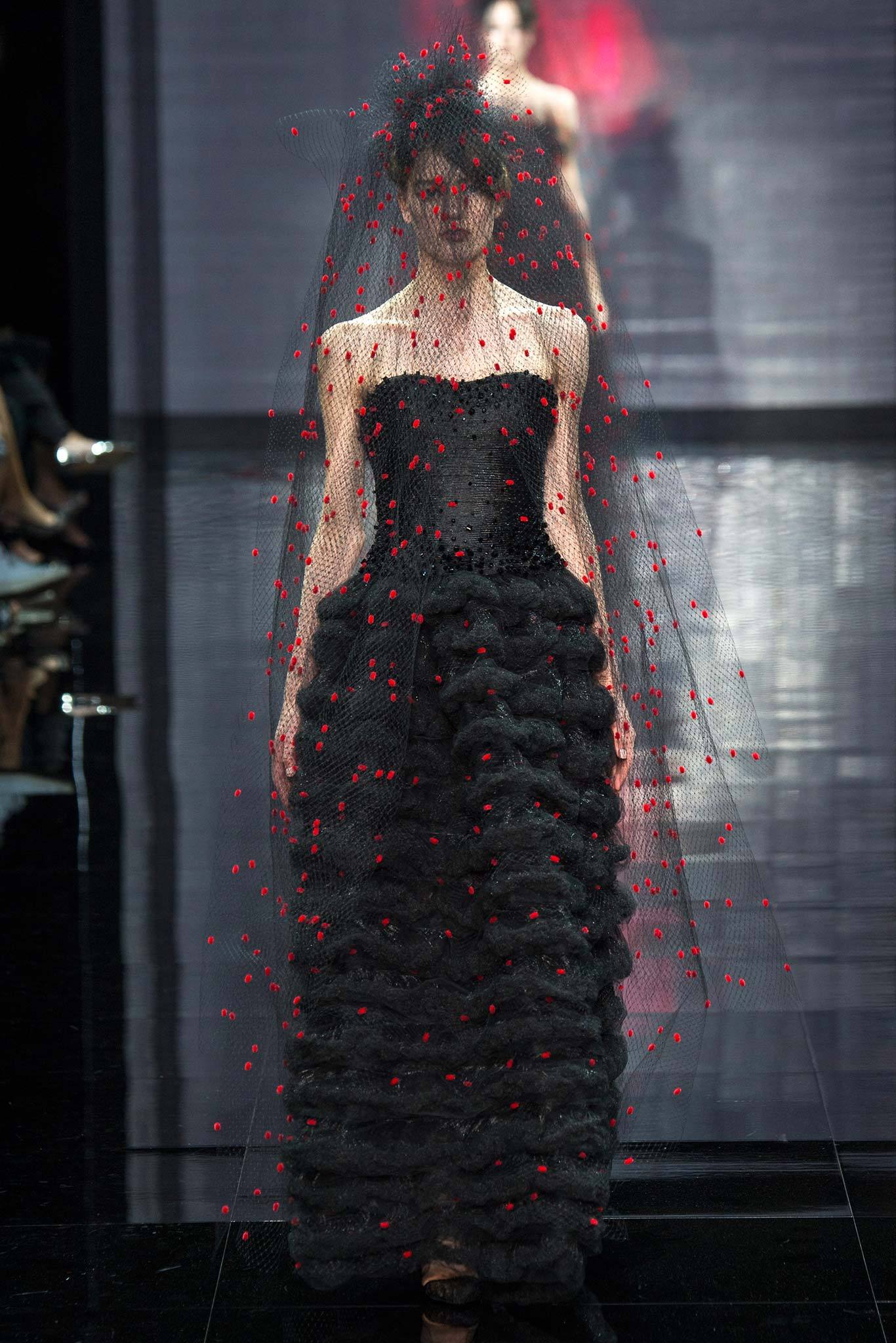 black ruffled gown with veil