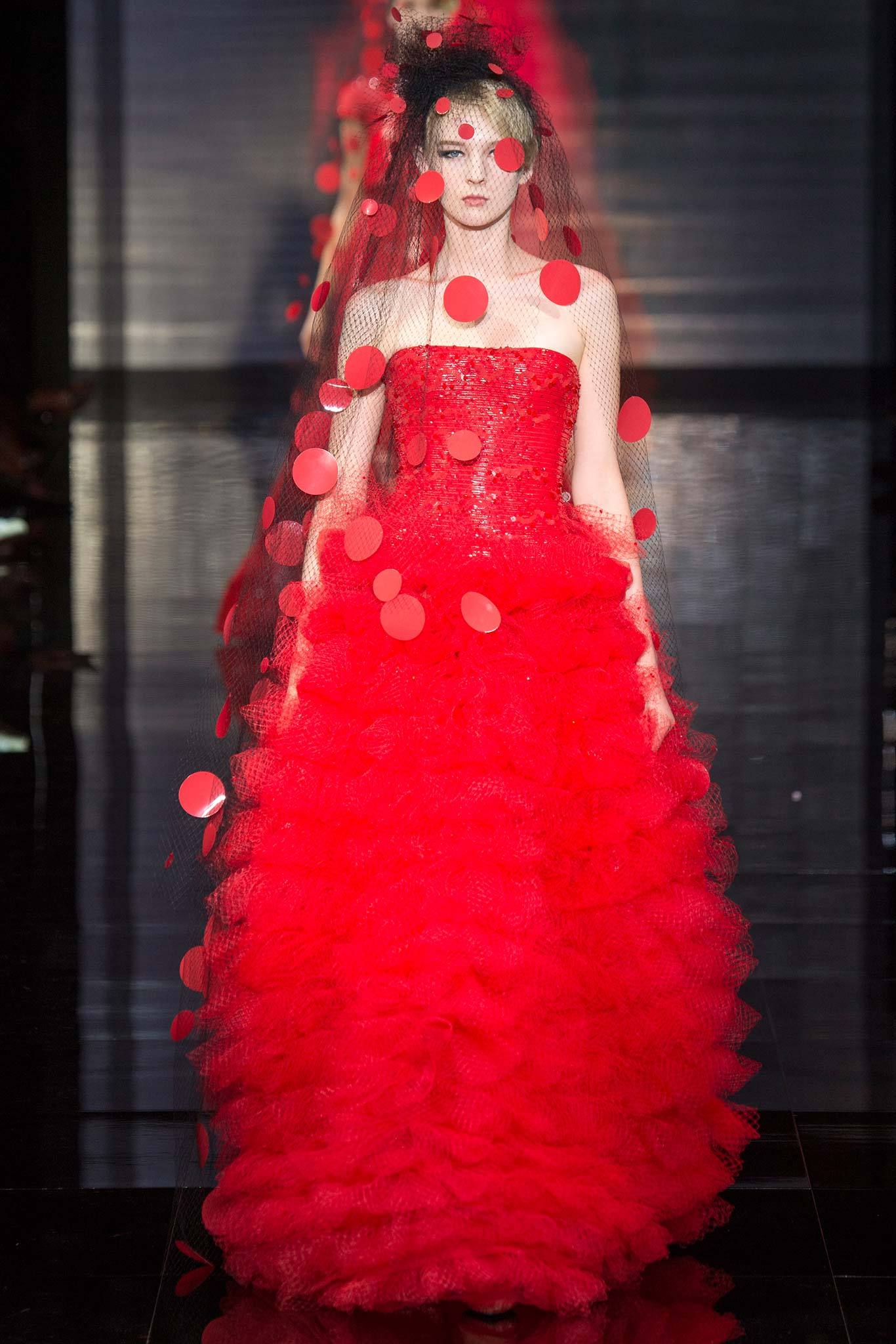 red ruffled strapless gown