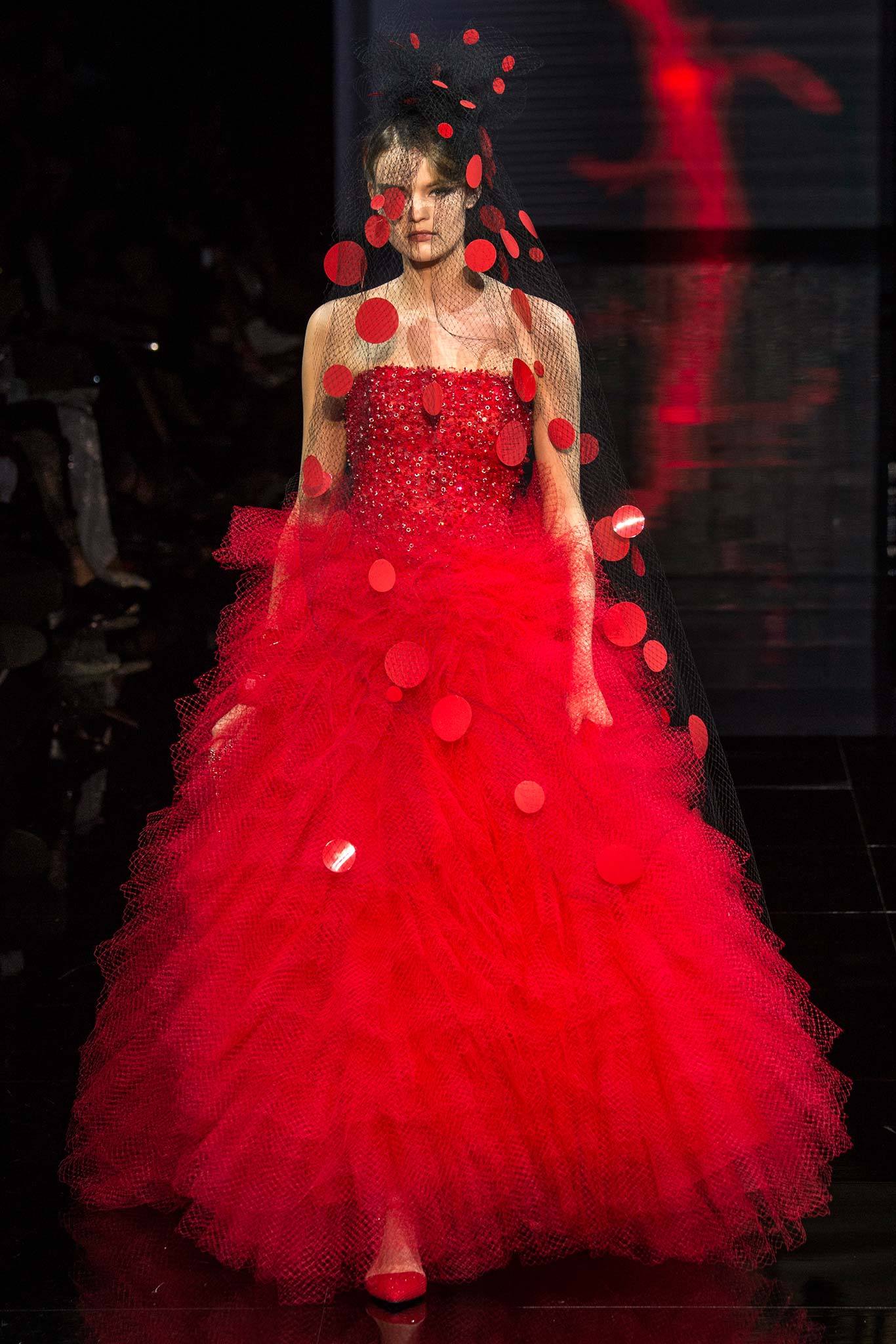 red tiered gown with black veil