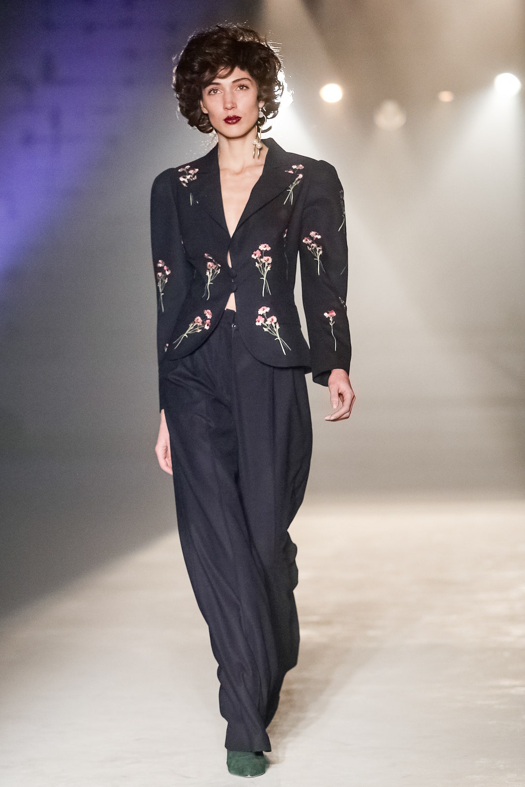 black fitted blazer and relaxed pants