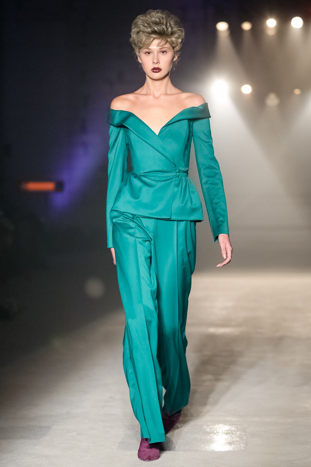 teal fitted suit with off-shoulder top