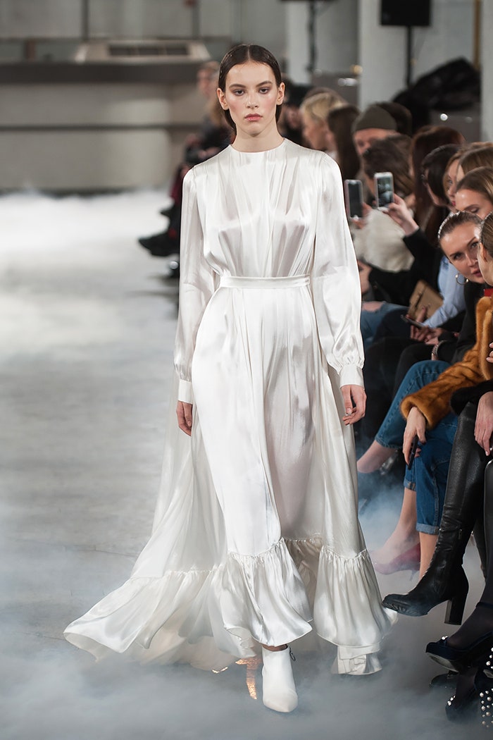 white silk long-sleeve gown