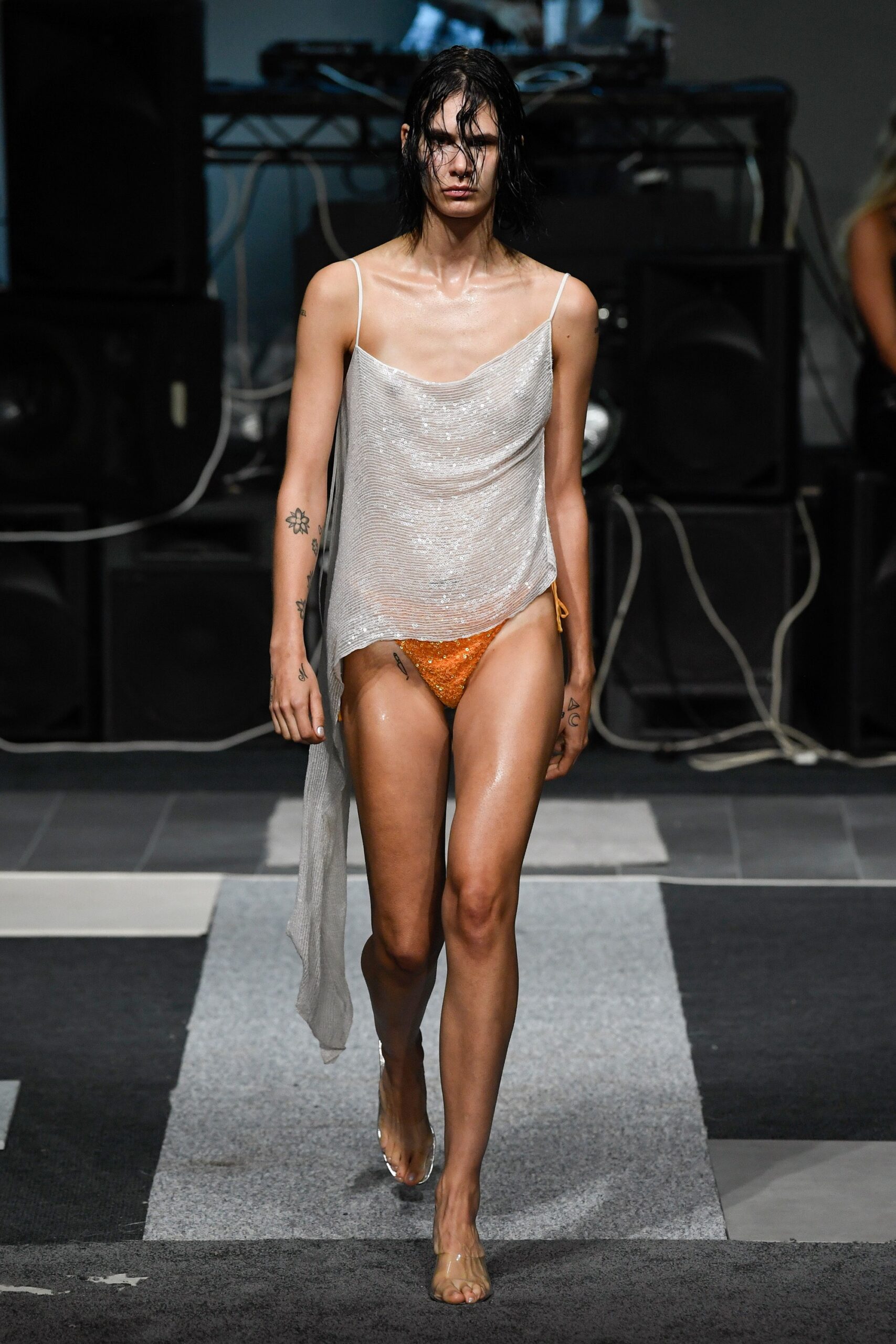 sheer white top and orange bikini
